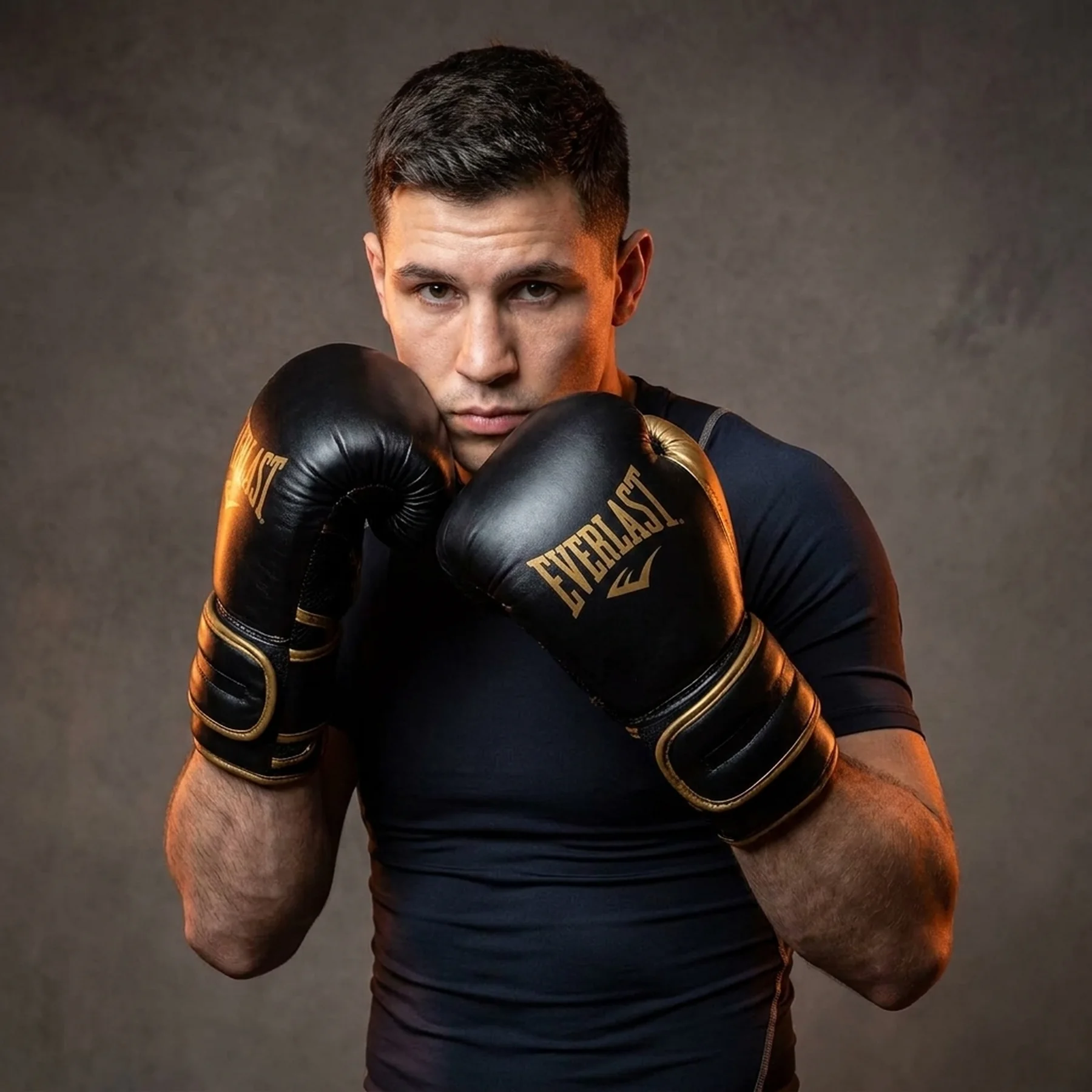 Боксерські рукавиці Everlast POWERLOCK 2R TRAINING GLOVE чорний, золотий 10 унцій (P00002661)