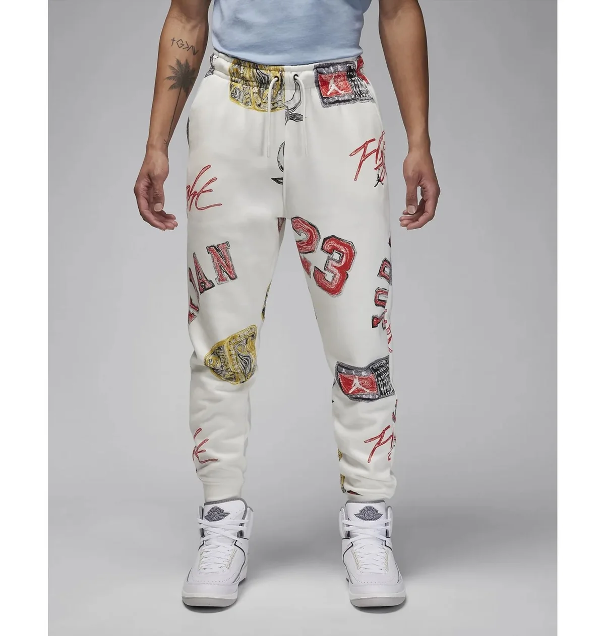 Брюки чоловічі Jordan M Ess Aop Flc Pant (FN4547-133) — Одяг
