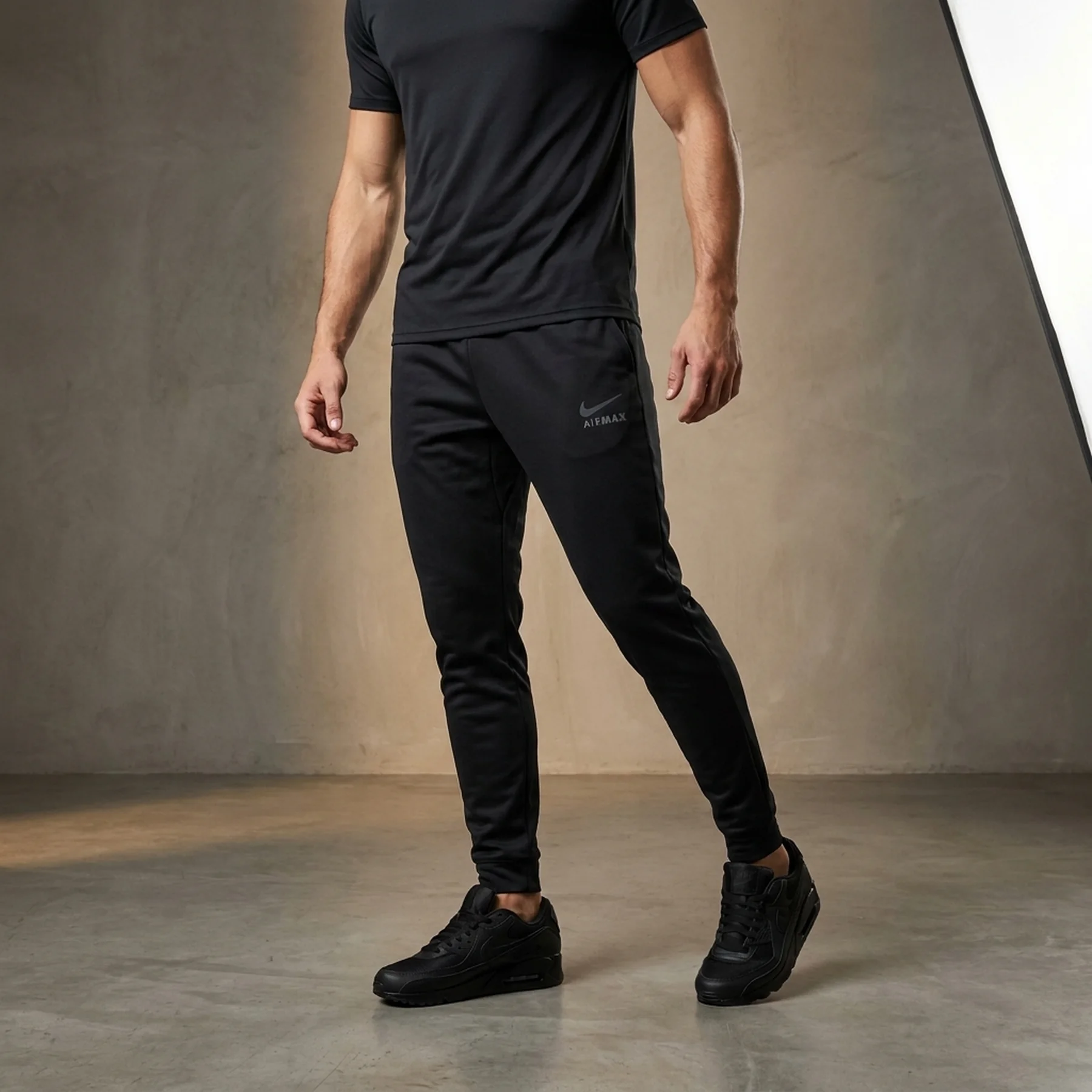 Брюки чоловічі Nike Air Max (DO7235-010)