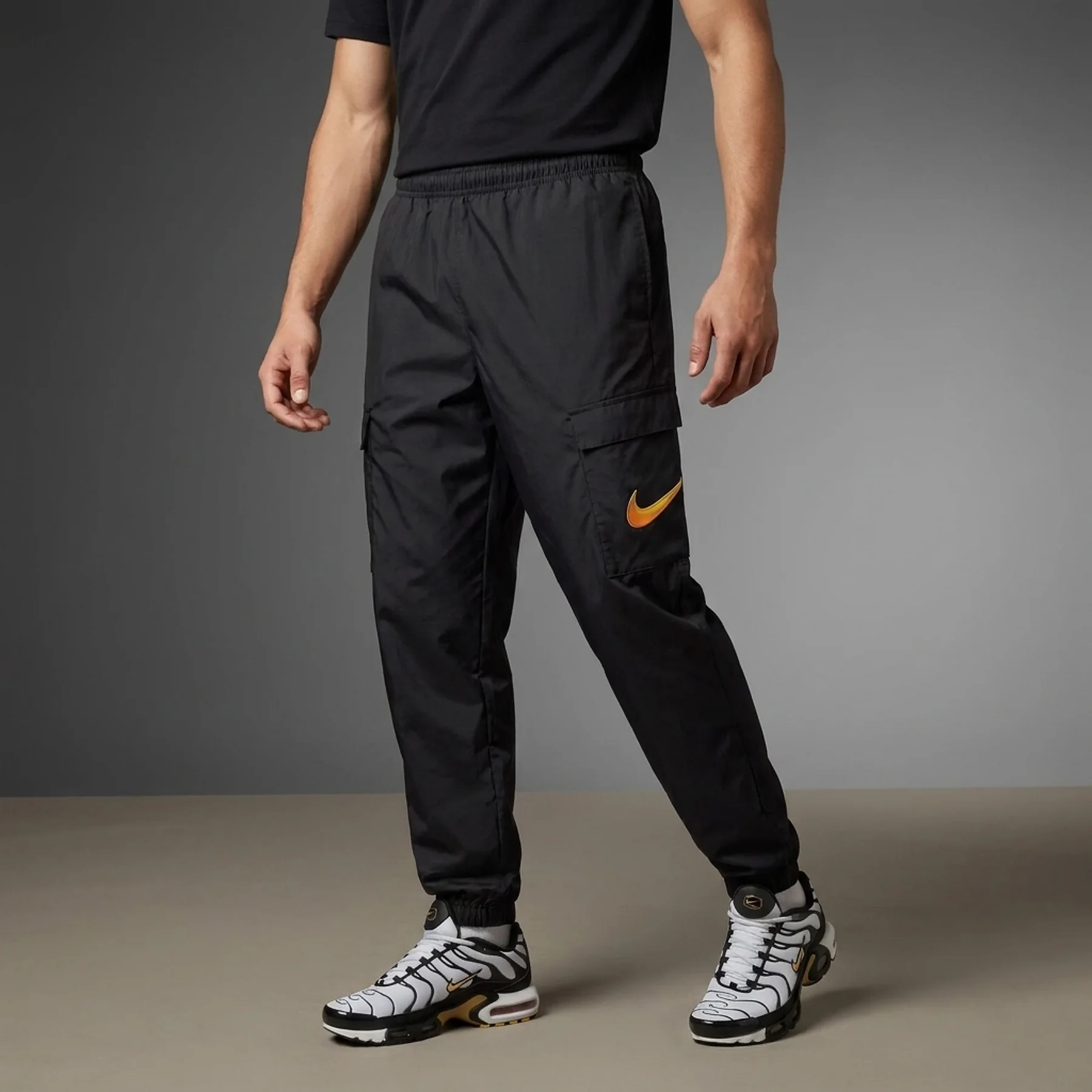 Брюки чоловічі Nike Cargo Swoosh Pants (FQ7162-010)
