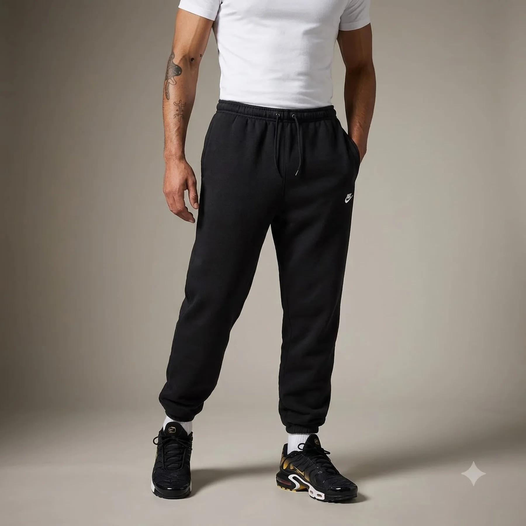 Брюки чоловічі Nike Club Cuffed Brushed Fleece (FN3808-010)