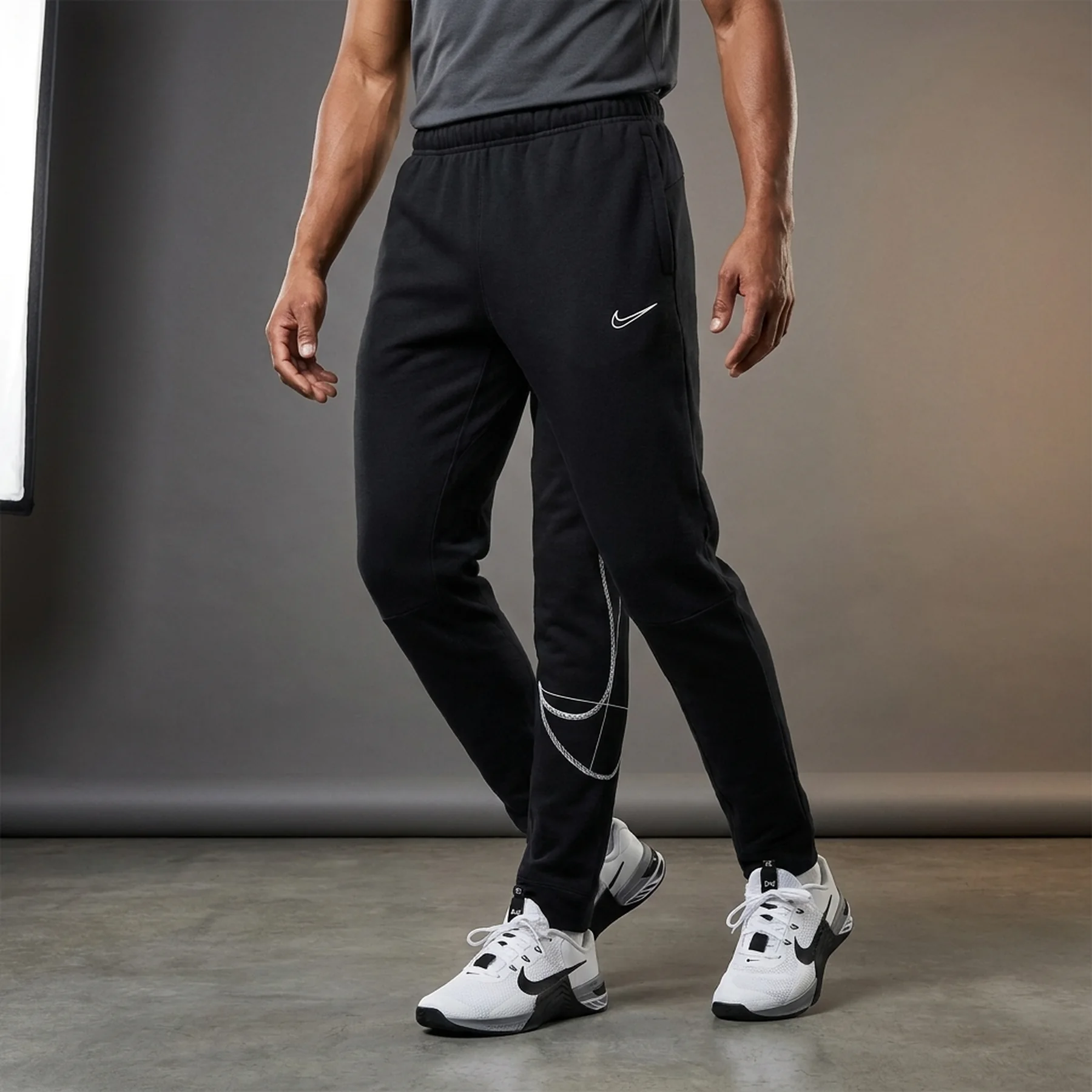 Брюки чоловічі Nike Dri-Fit Mens Fleece Tapered (DQ6614-010)