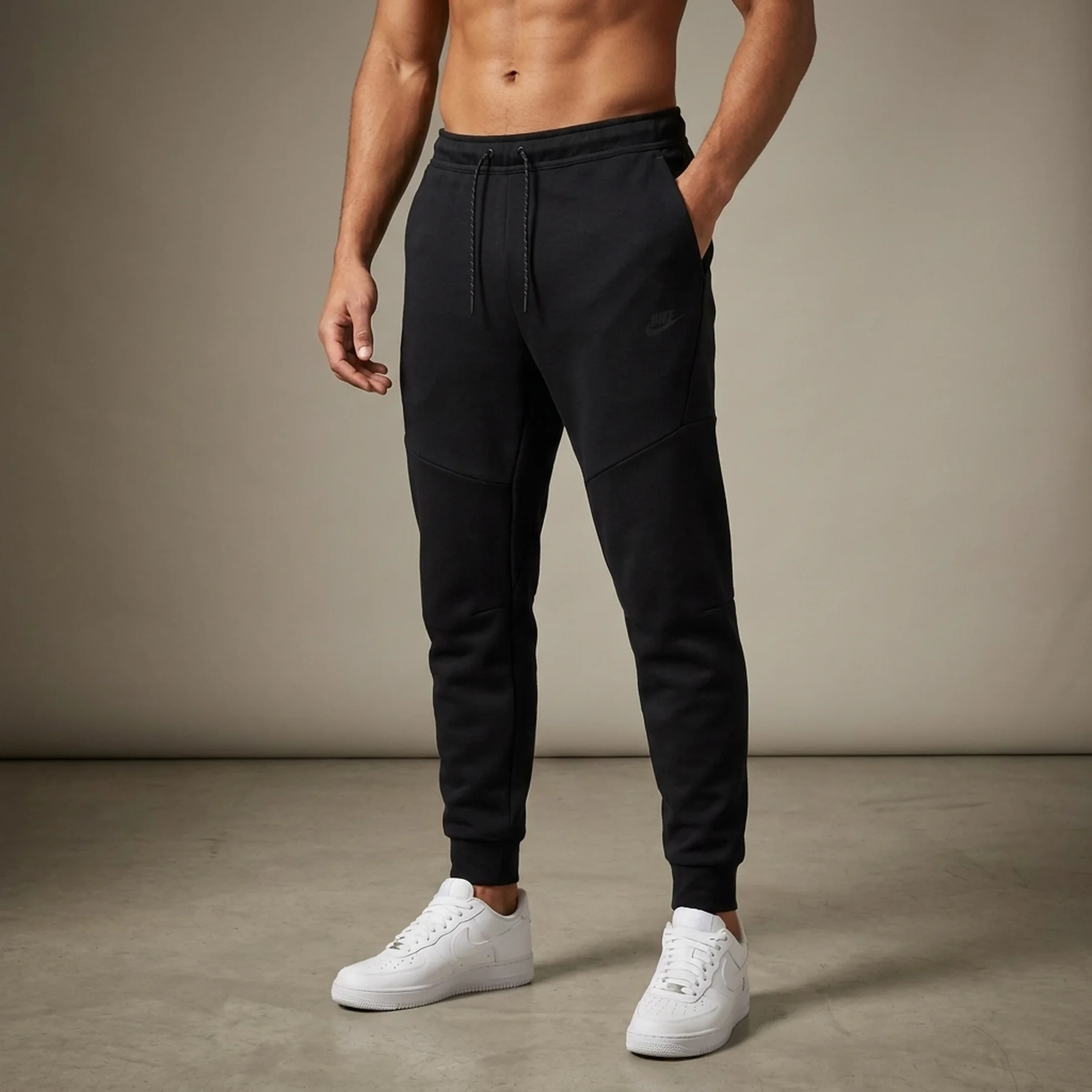 Брюки чоловічі Nike M Nk Tch Flc Gx Jggr (DX0581-010)