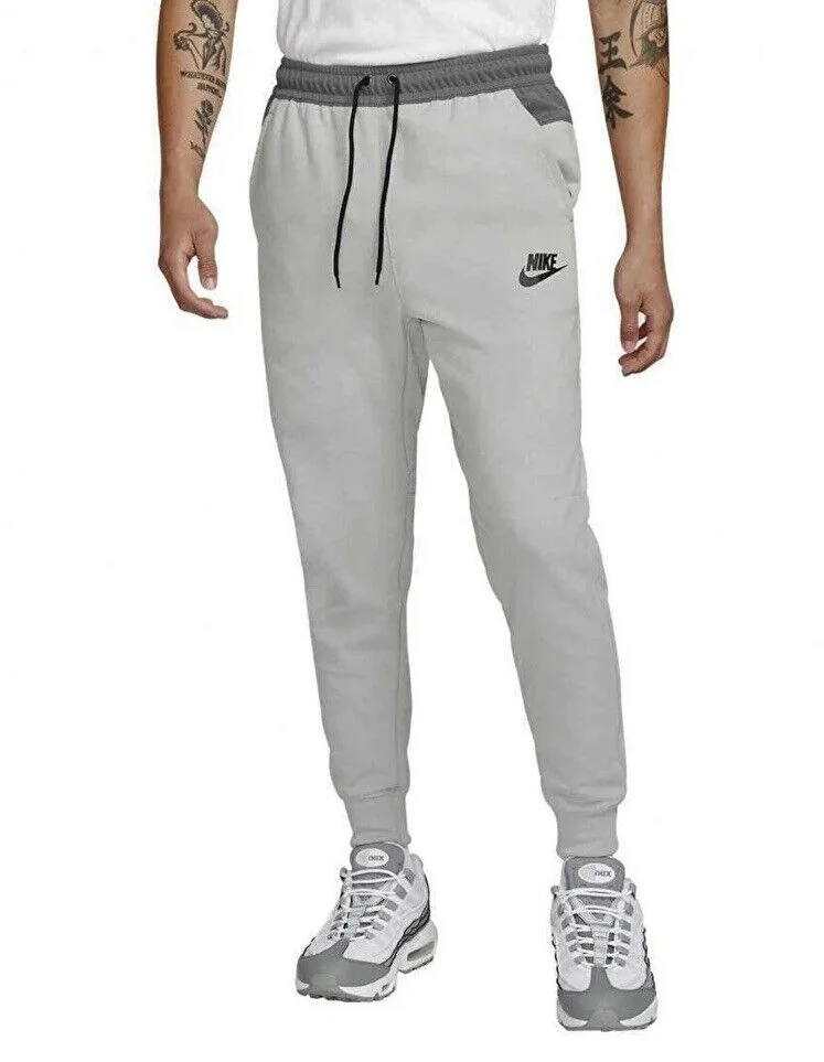 Брюки чоловічі Nike Portswear Men's Full Zip (DD5293-077)