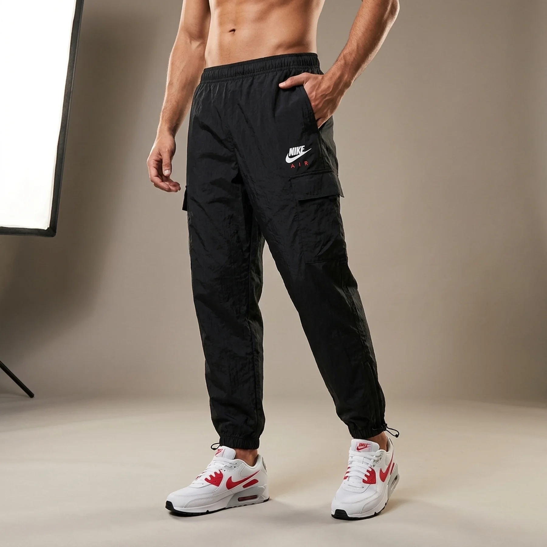 Брюки чоловічі Nike Sportswear Sw Air Track (FZ8371-010)