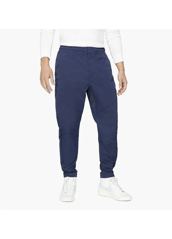 Брюки чоловічі Nike Sportswear Tech Essentials (DH4224-410)