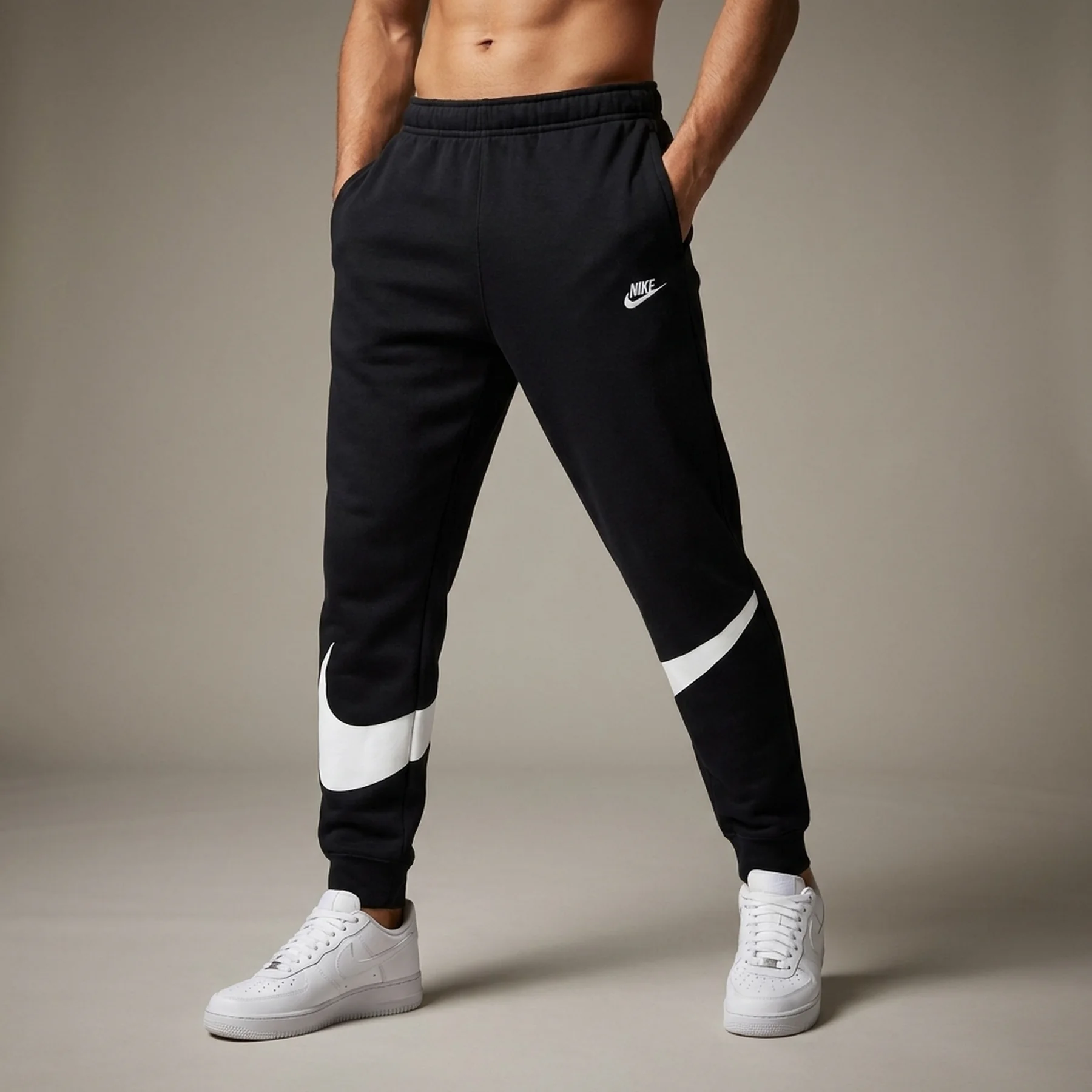 Брюки чоловічі Nike Swoosh (DX0564-010)