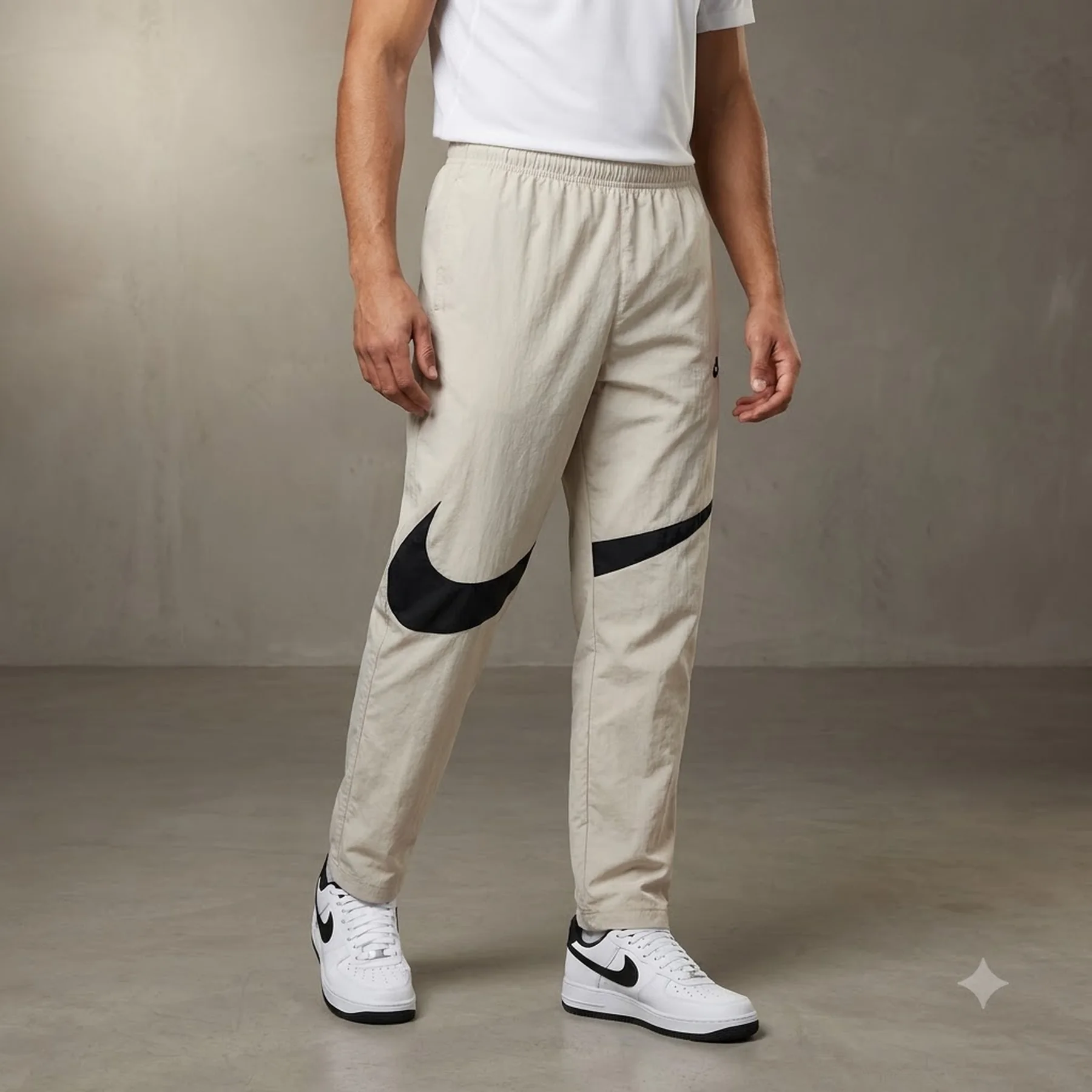 Брюки чоловічі Nike Swoosh Pant (FB7880-113)