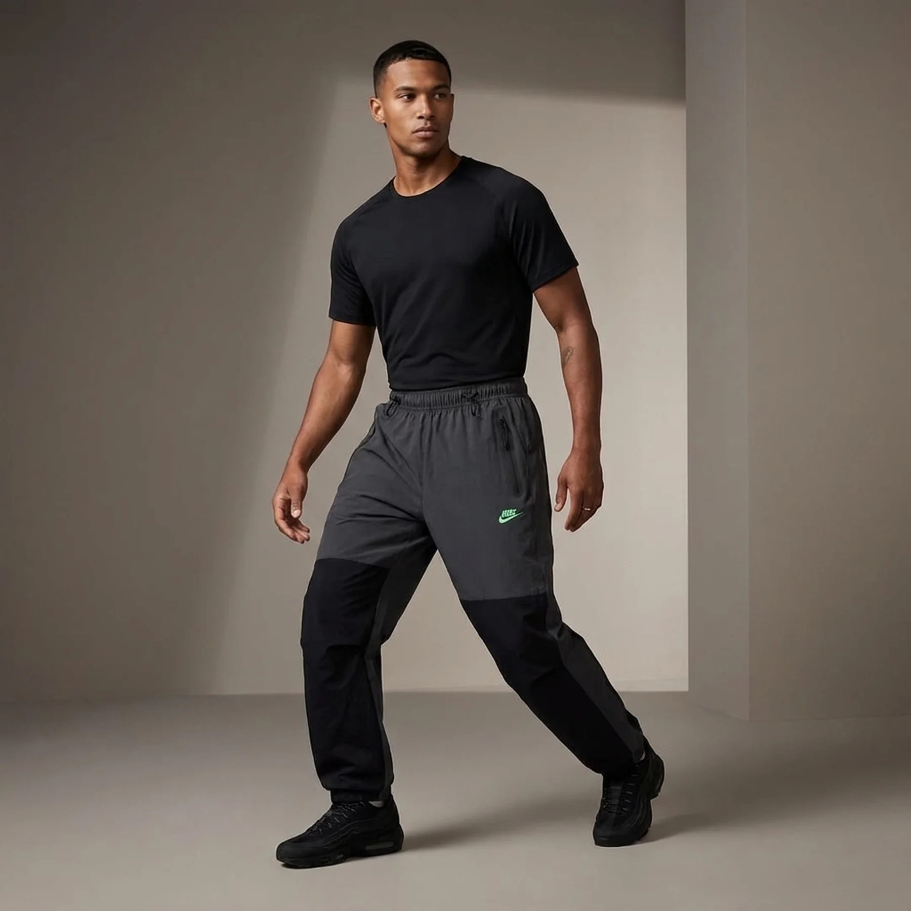 Брюки чоловічі Nike Tech Woven Black/Grey (HM7158-060)