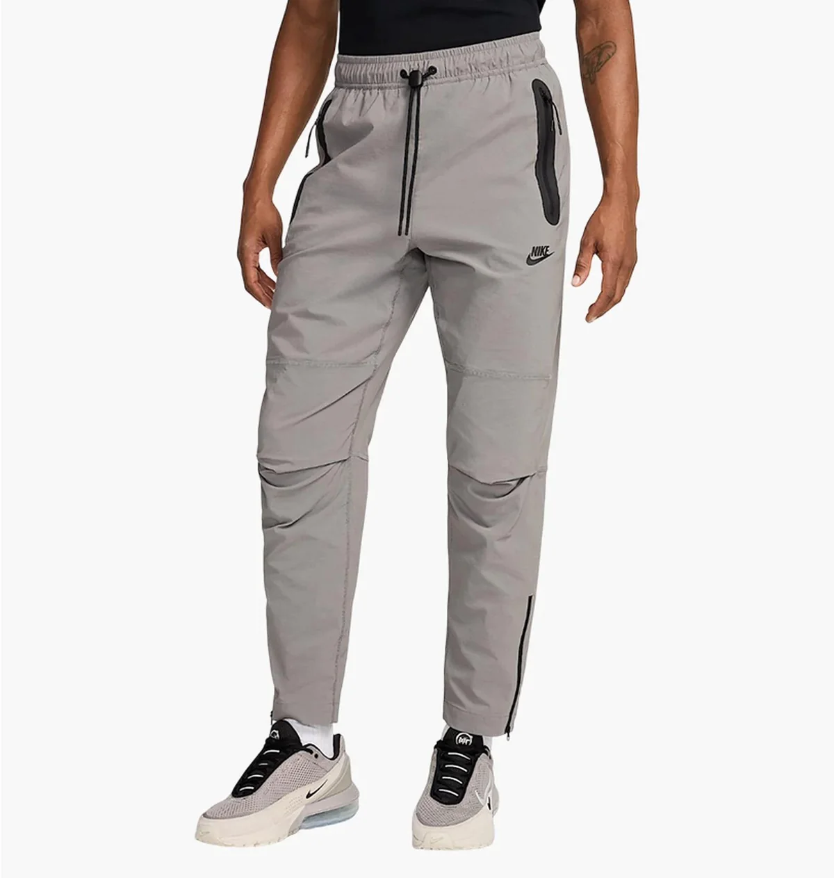 Брюки чоловічі Nike Tech Woven Grey (HM8241-014) — Одяг