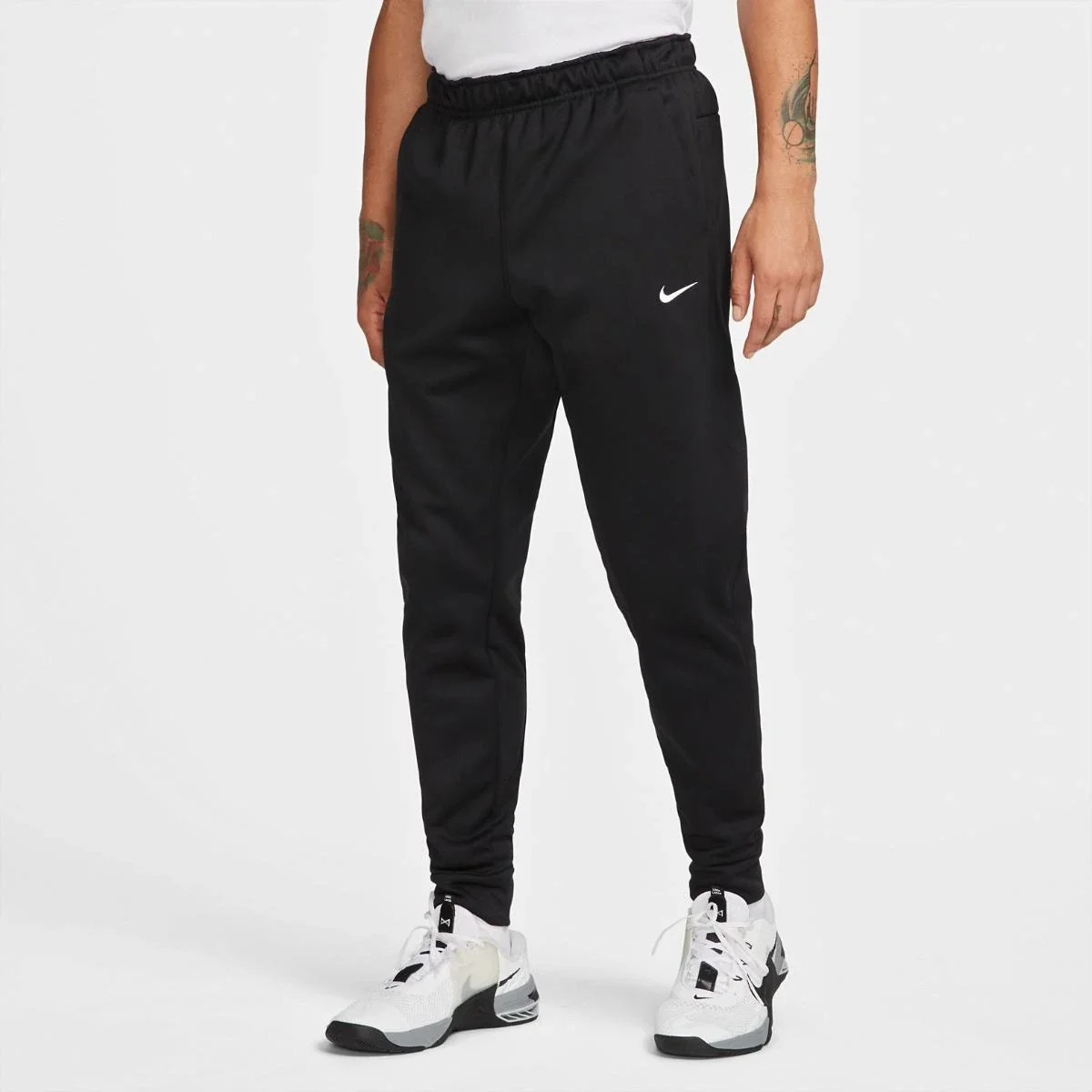 Брюки чоловічі Nike Therma-Fit Tapered Pant (DQ5405-010) — Одяг
