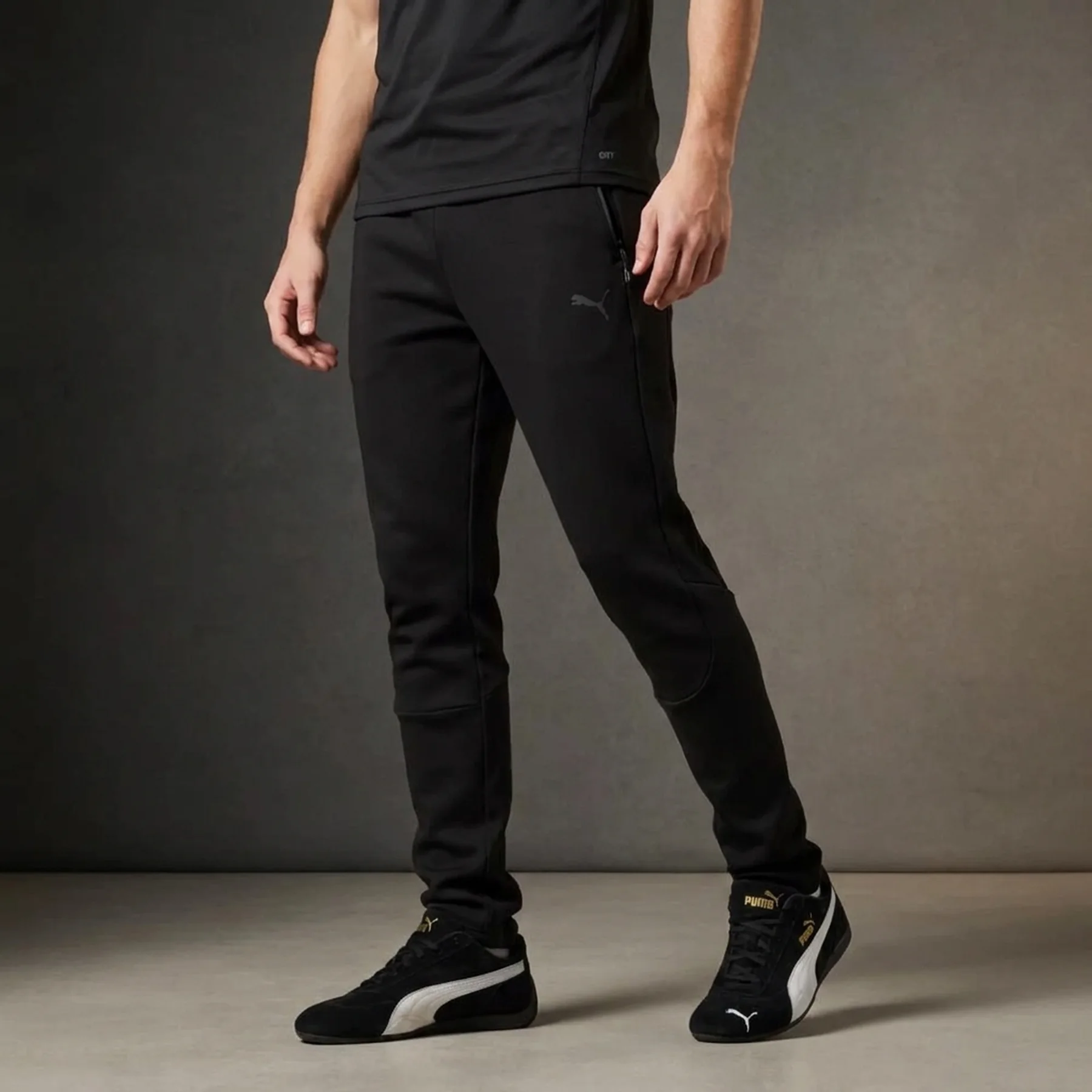 Брюки чоловічі Puma Evostripe Core Pants (63153301)