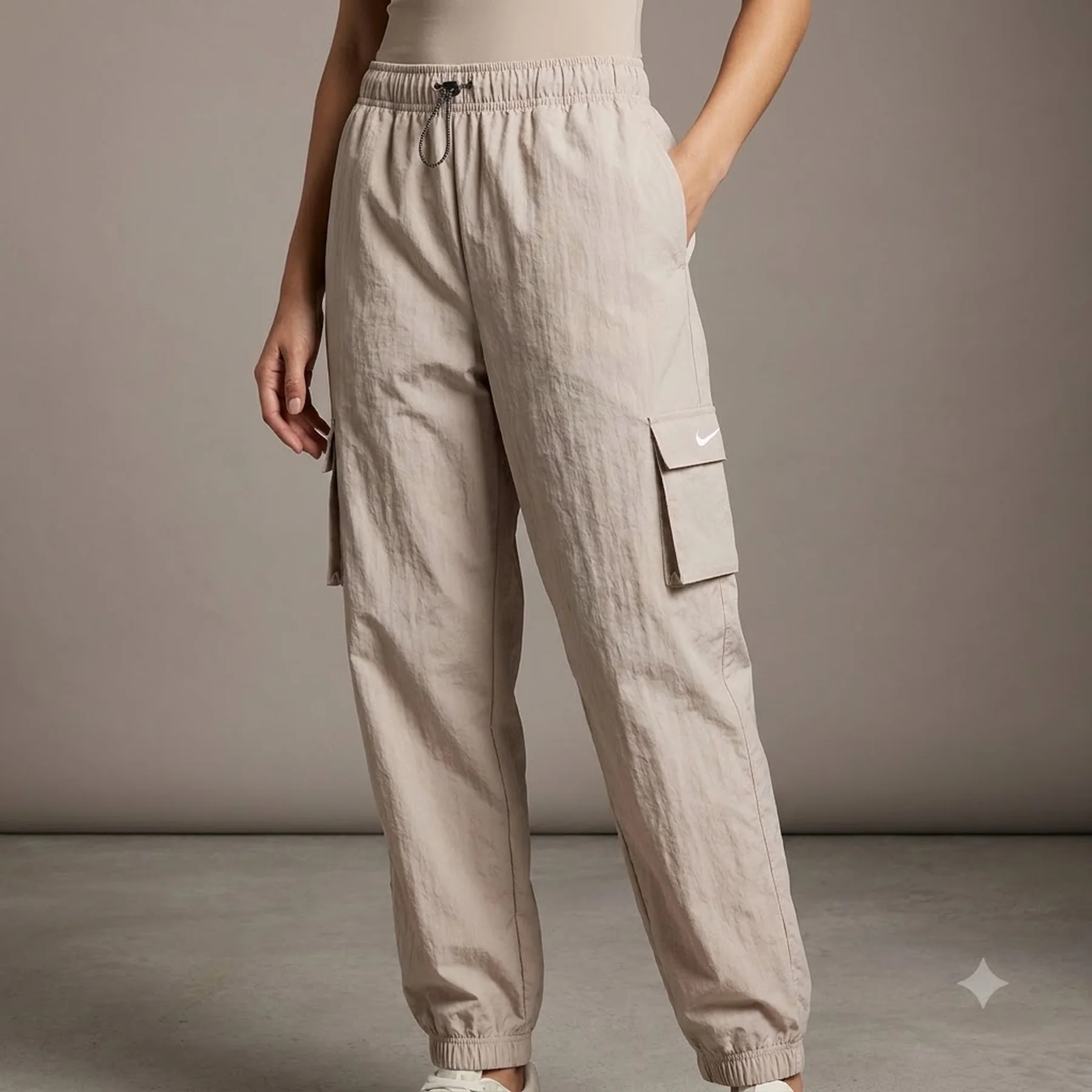 Брюки унісекс Nike Sportswear Essential (DO7209-272)