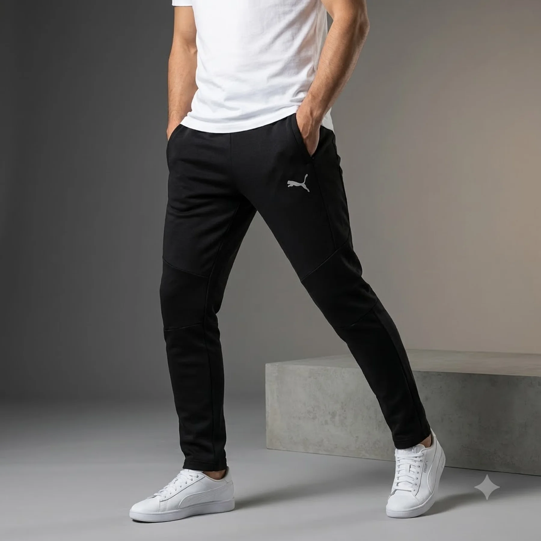 Брюки унісекс Puma Evostripe Pants Dk (68823401)