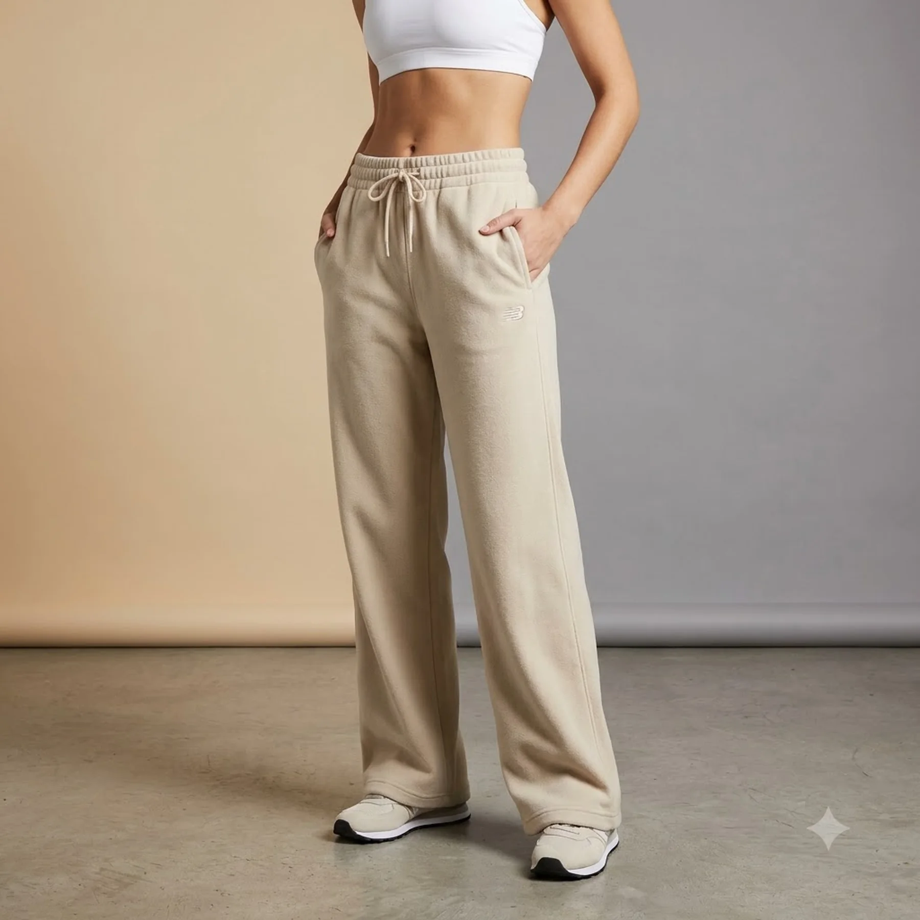 Брюки жіночі New Balance Coastal Fleece Beige (WP51503LIN)