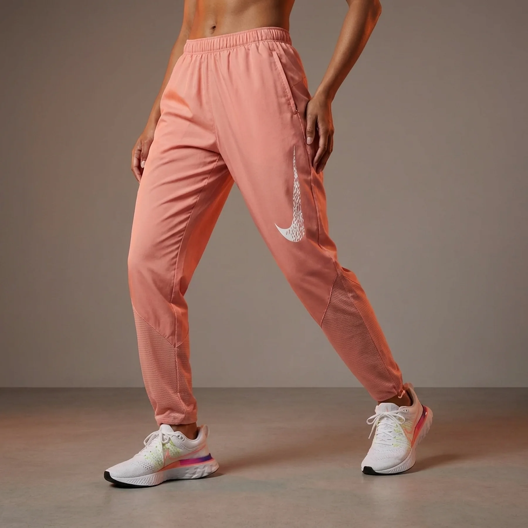 Брюки жіночі Nike Df Swoosh Run Pant (DM7771-824)