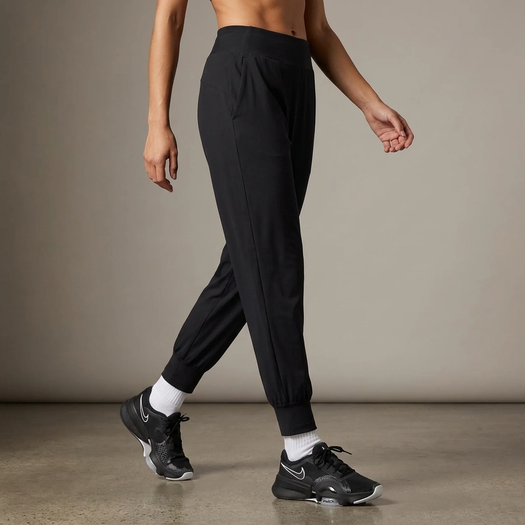 Брюки жіночі Nike Dri-Fit Bliss Mid-Rise 7/8 Joggers (DV9453-010)