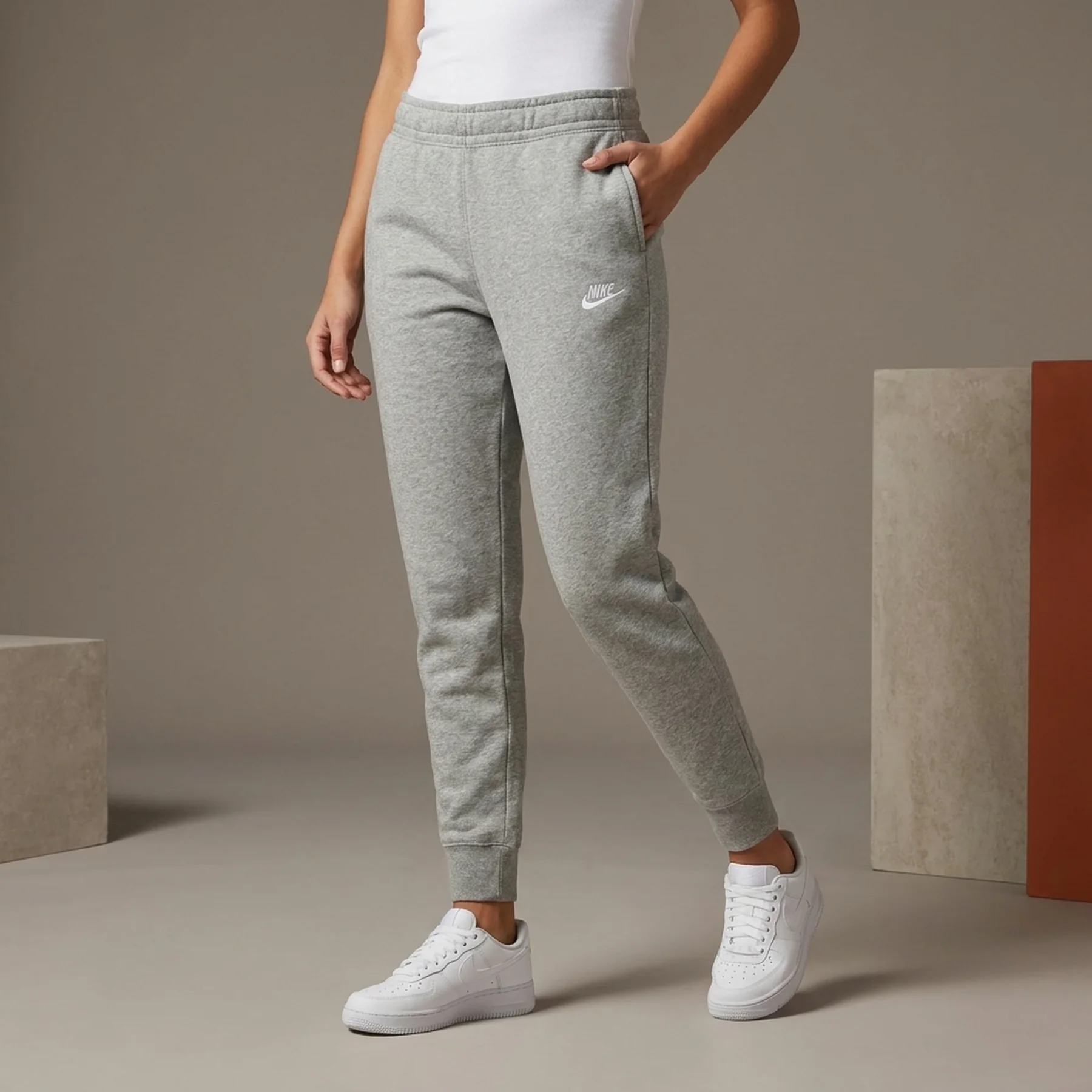 Брюки жіночі Nike Fleece Mid-Rise Slim Joggers (DQ5174-063)