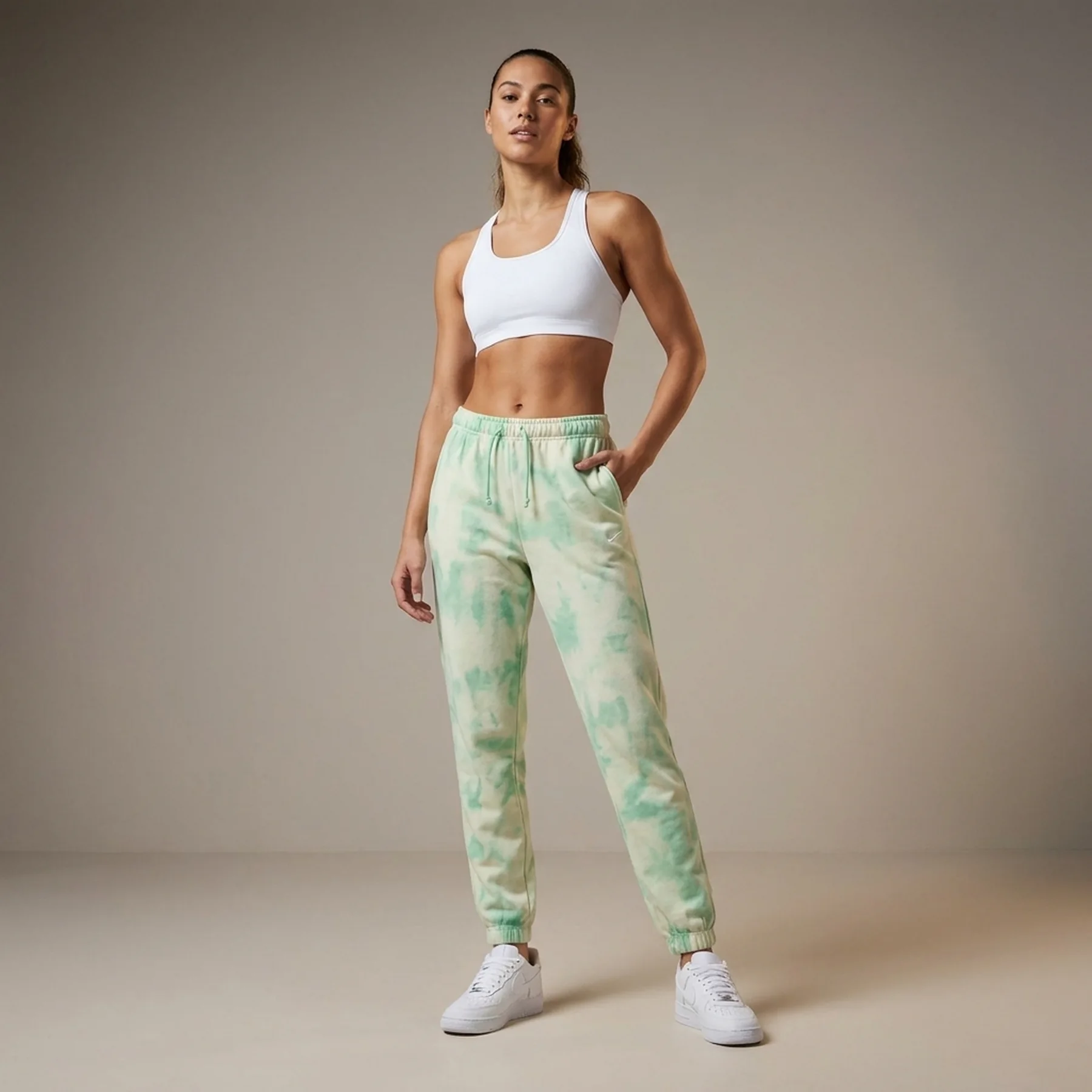 Брюки жіночі Nike Nsw Cld Dye Jrsy Mr Jggr (DM6714-379)