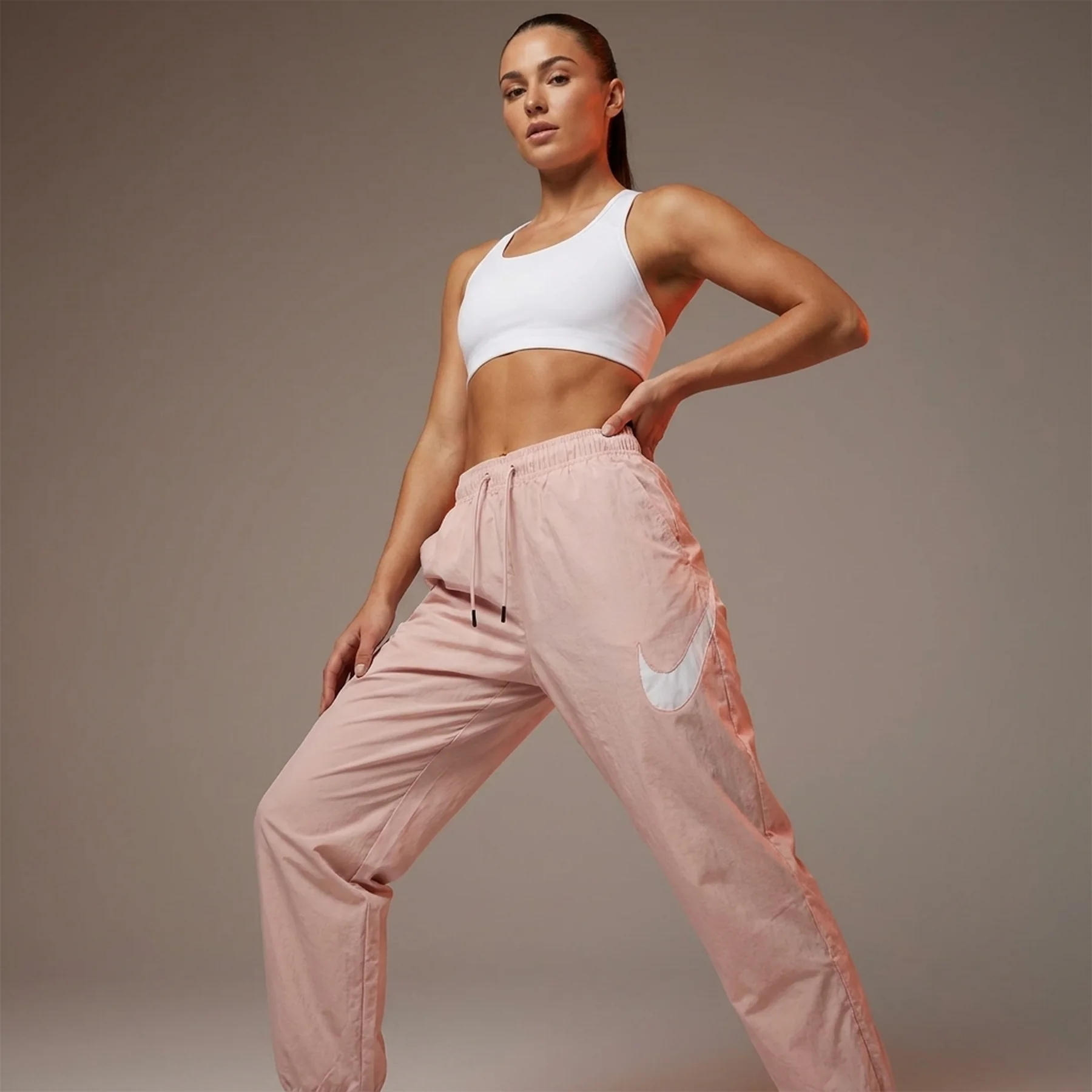 Брюки жіночі Nike Nsw Essntl Wvn Mr Pant Hbr (DM6183-601)