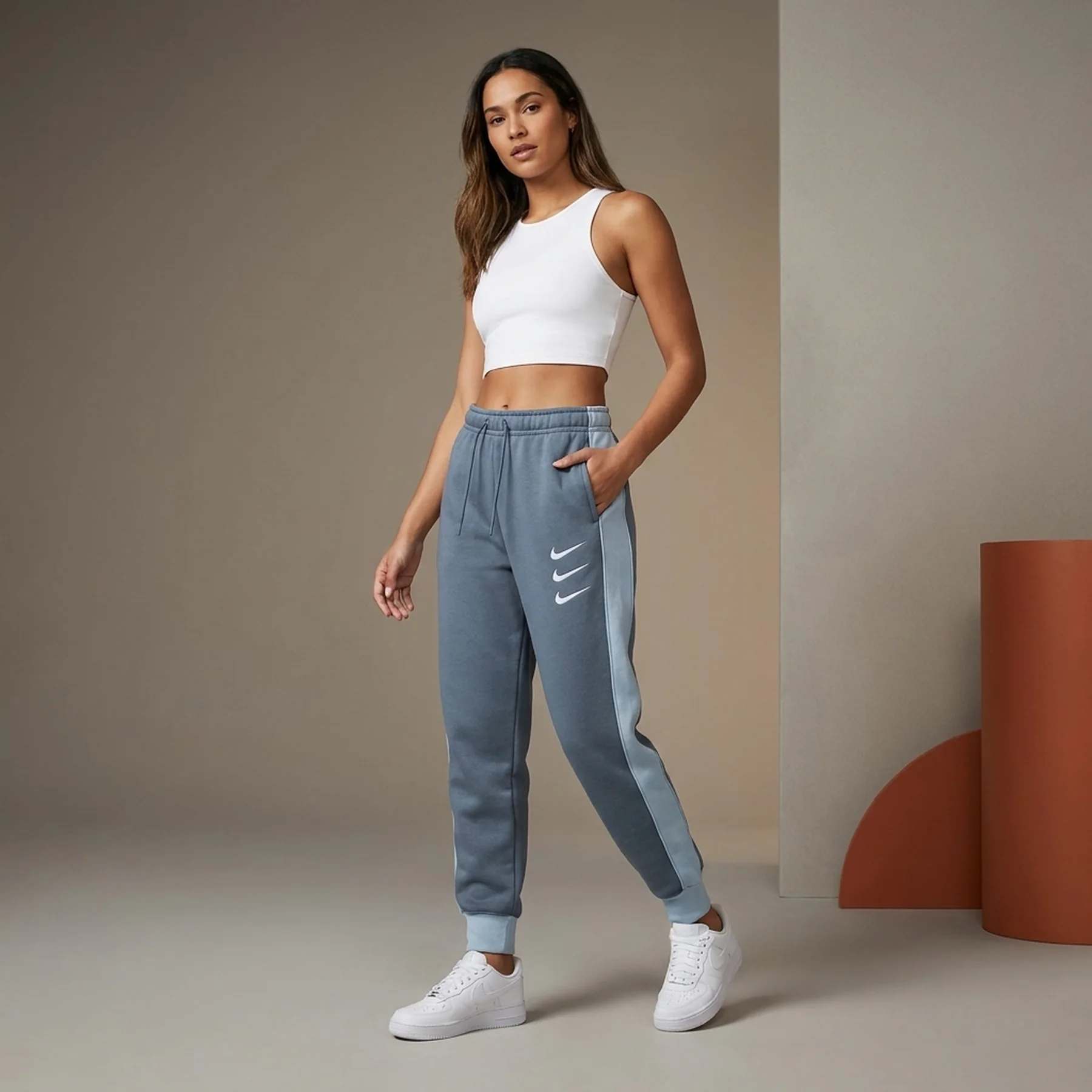 Брюки жіночі Nike Nsw Gx Mr Flc Jggr Opal (DD5129-437)