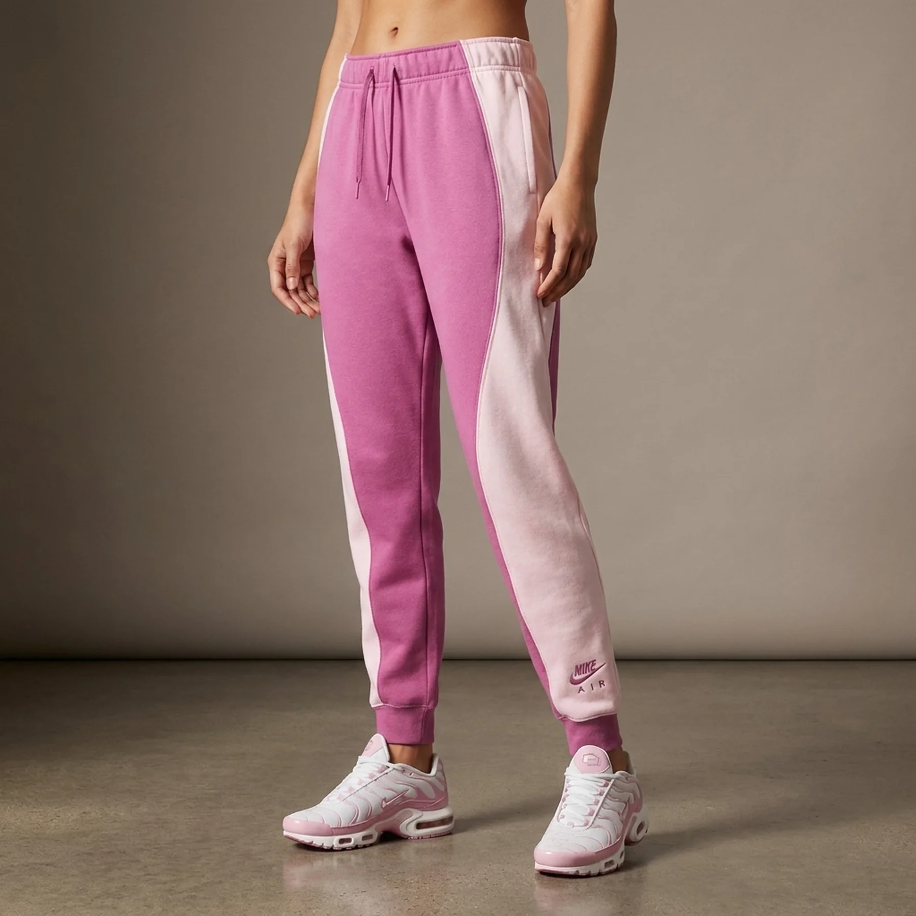 Брюки жіночі Nike Nsw Mid-Rise Air Fleece Joggers Pink (DV8050-665)