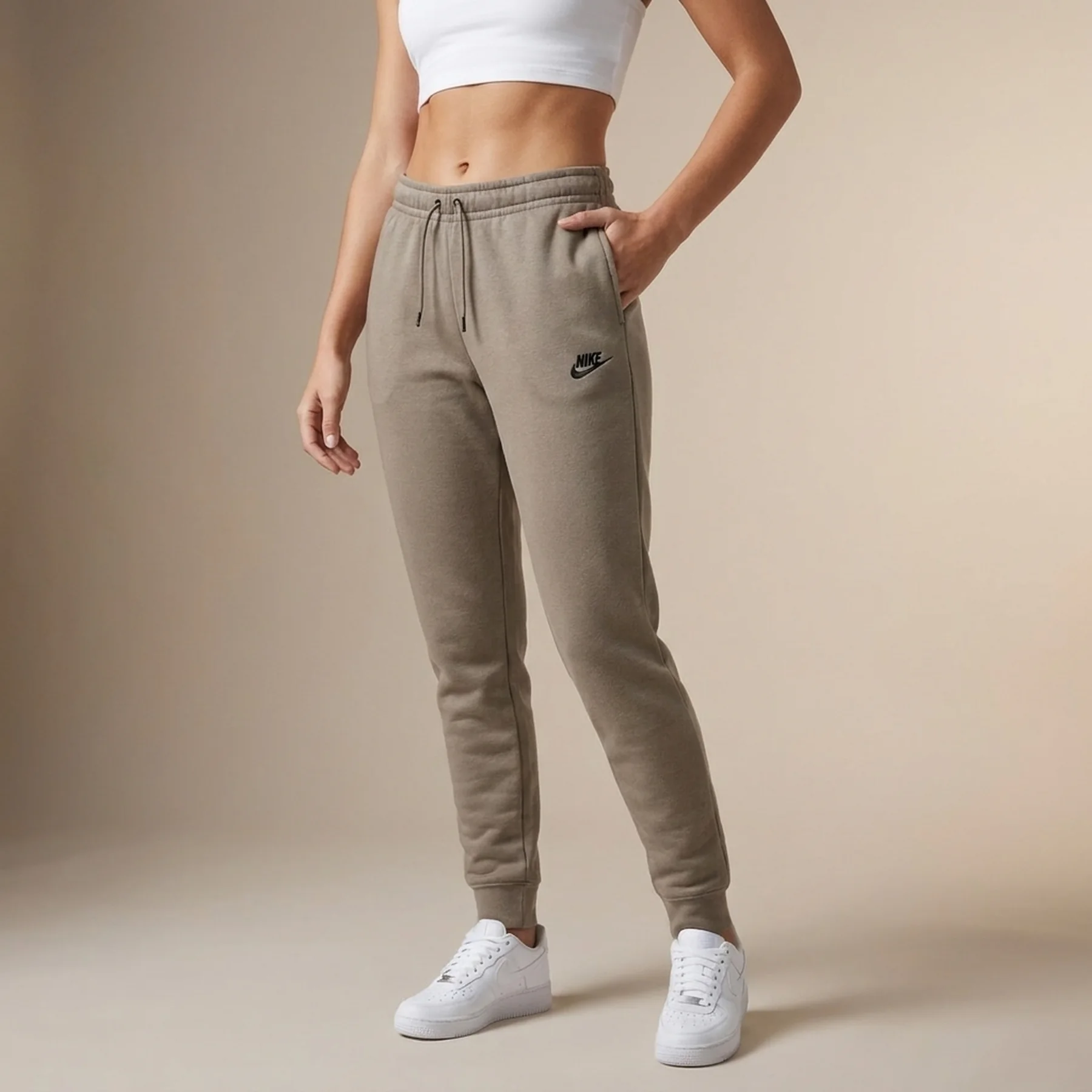 Брюки жіночі Nike Sportswear Essential Beige (DX2320-040)