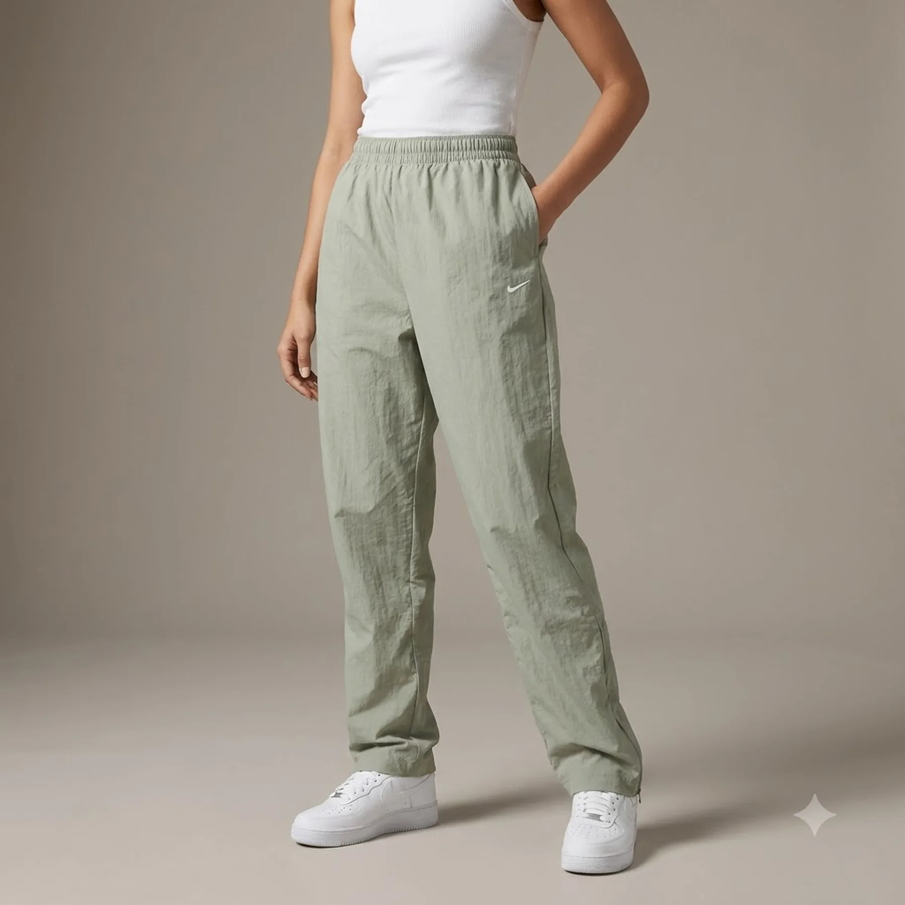 Брюки жіночі Nike Sportswear Essential Open-Hem Zip Pants Grey (FV7638-370)