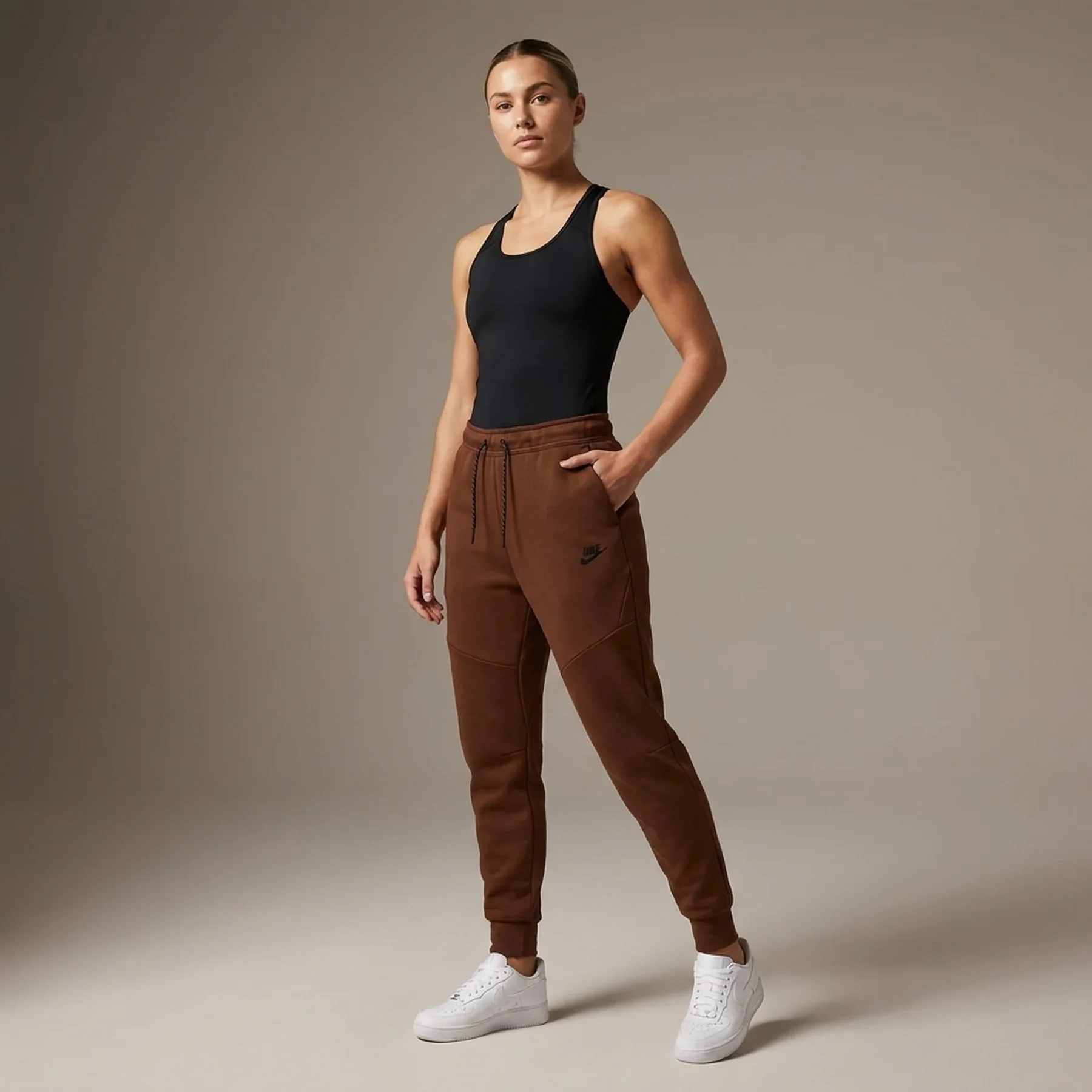 Брюки жіночі Nike Sportswear Tech Fleece Joggers (CU4495-259)