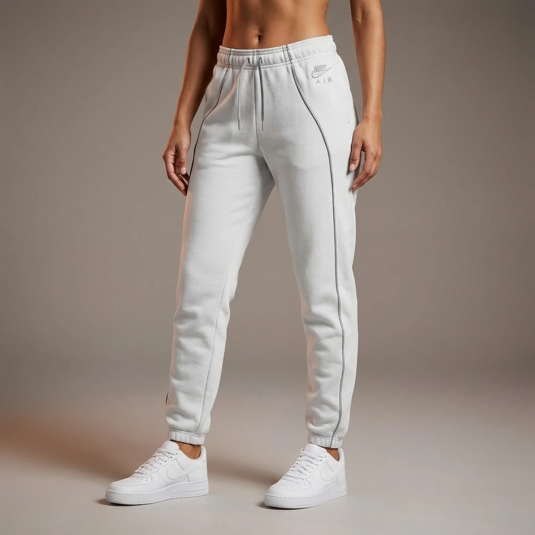 Брюки жіночі Nike W Nsw Air Flc Mr Jogger (DQ6563-043)