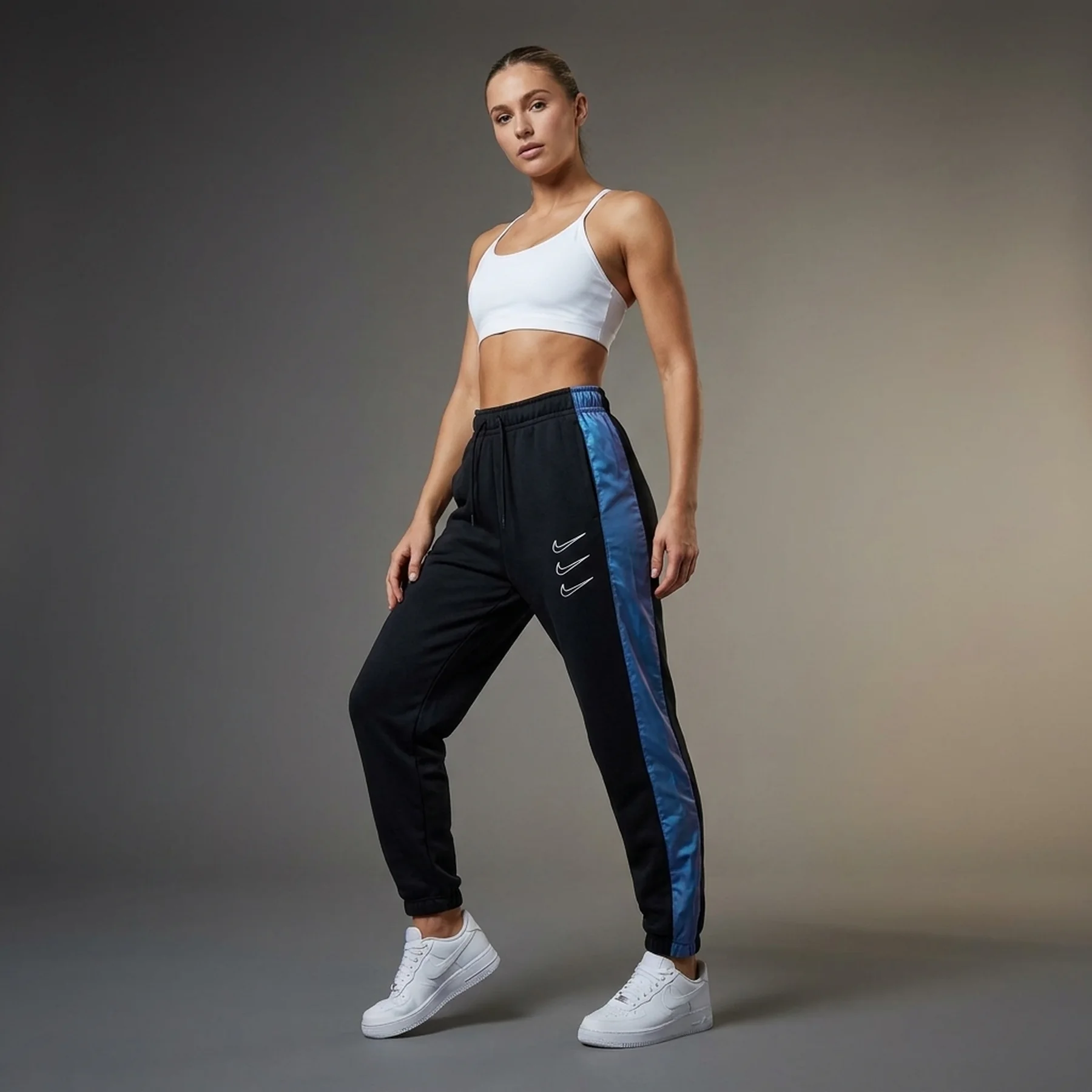 Брюки жіночі Nike W Nsw Gx Mr Flc Jggr Opal (DD5129-010)
