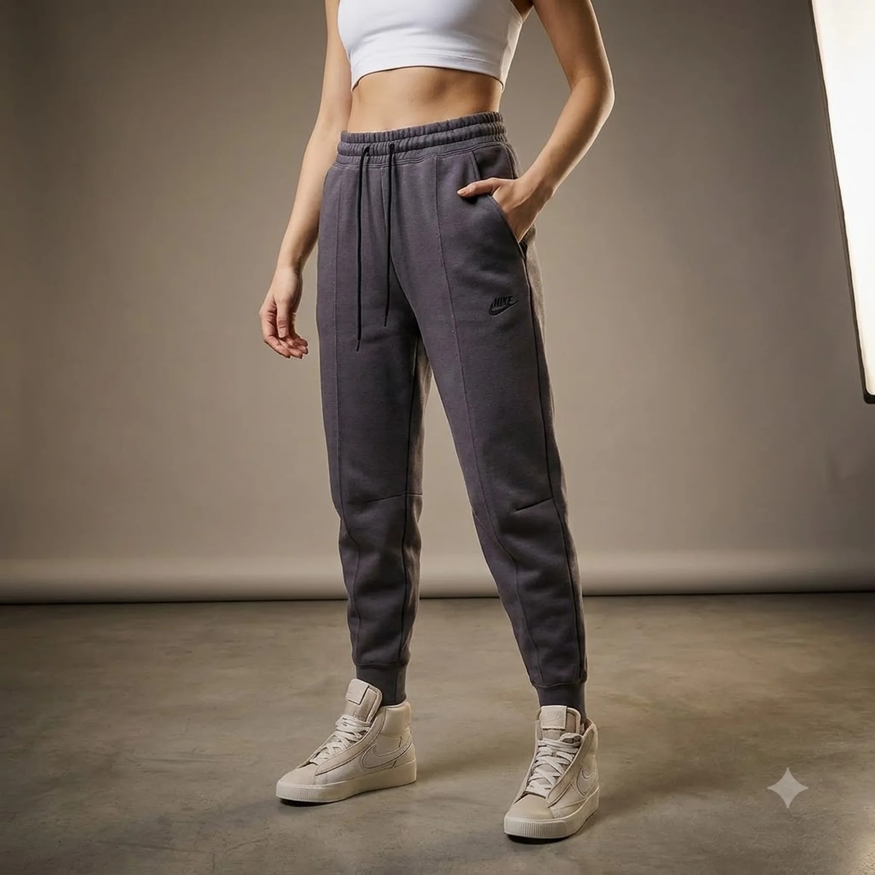 Брюки жіночі Nike W Nsw Tch Flc Mr Jggr (FB8330-003)