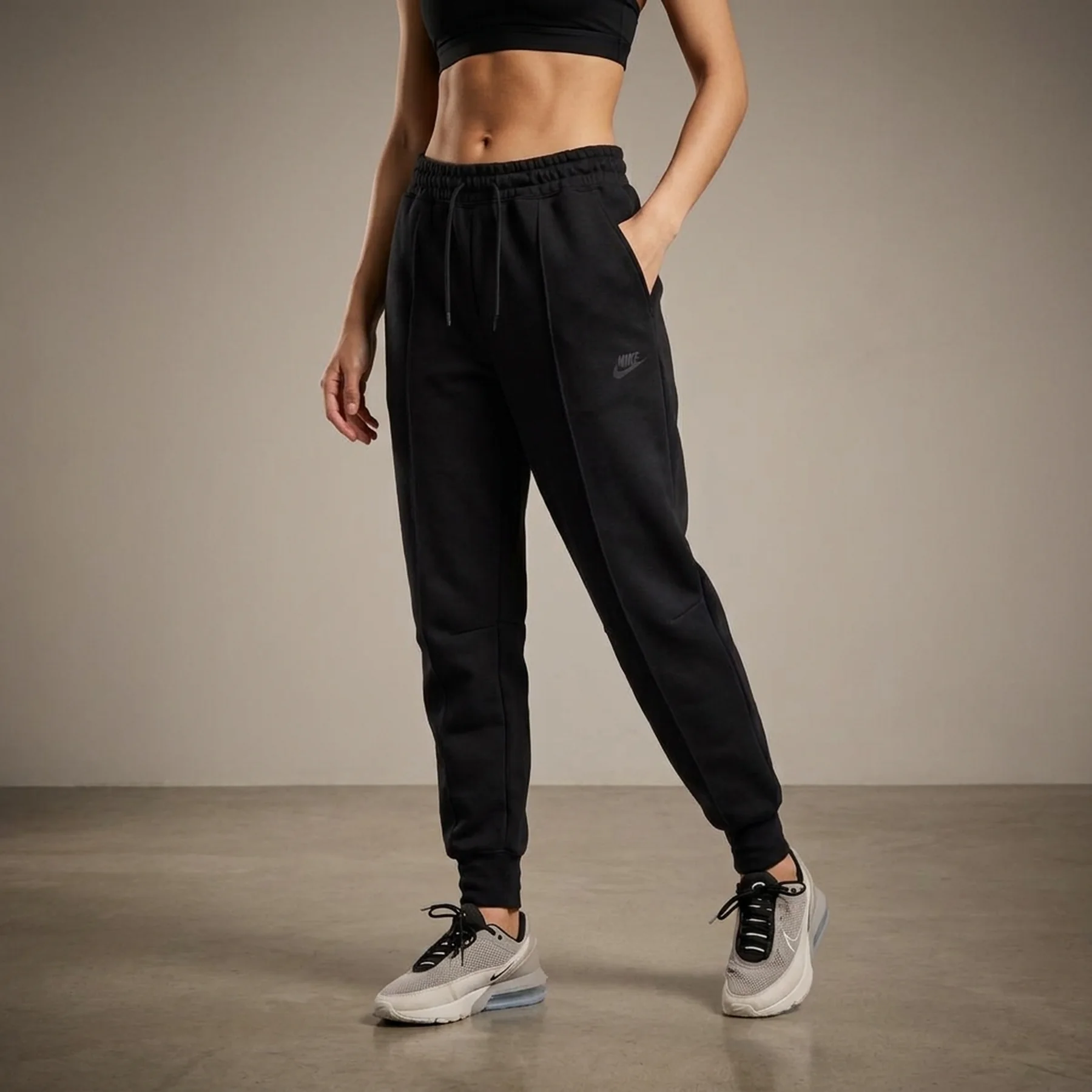 Брюки жіночі Nike W Nsw Tch Flc Mr Jggr (FB8330-010)