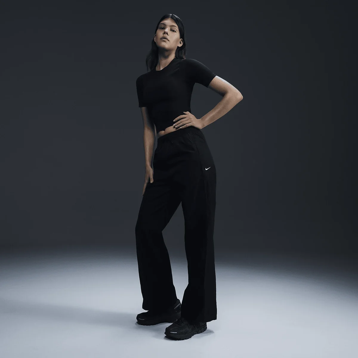 Брюки жіночі Nike Windrunner (FV7655-010) — Одяг