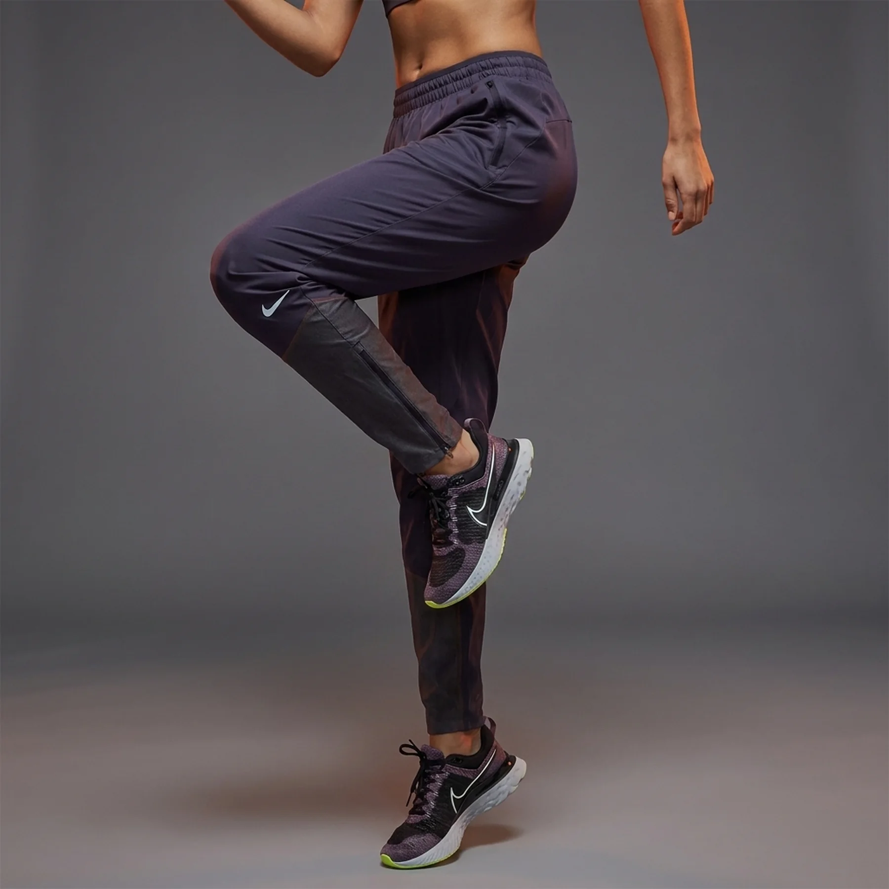 Брюки жіночі Nike Womens Running Pants Violet (DD6819-540)