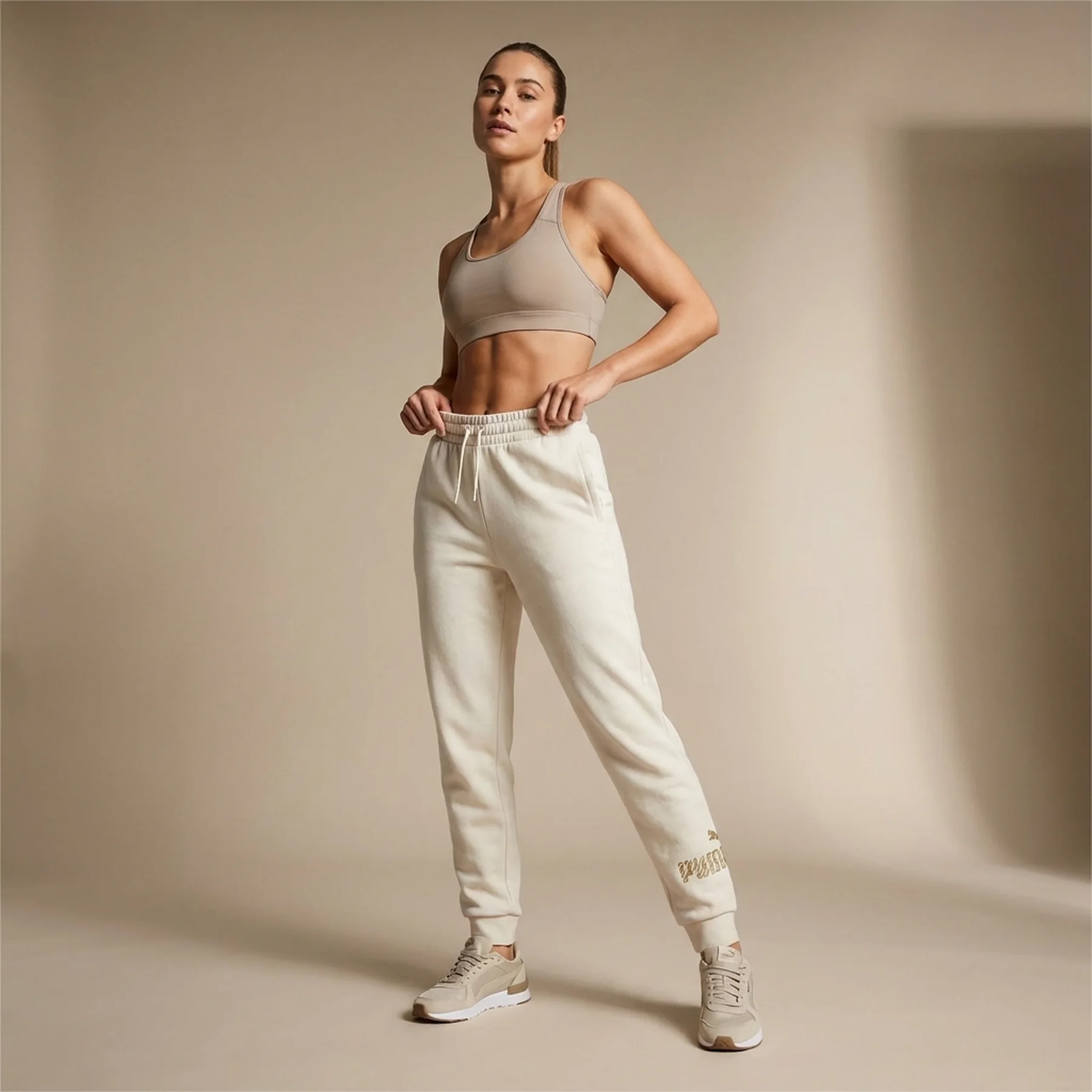 Брюки жіночі Puma Ess+ Animal Pants Fl Beige (681496-87)