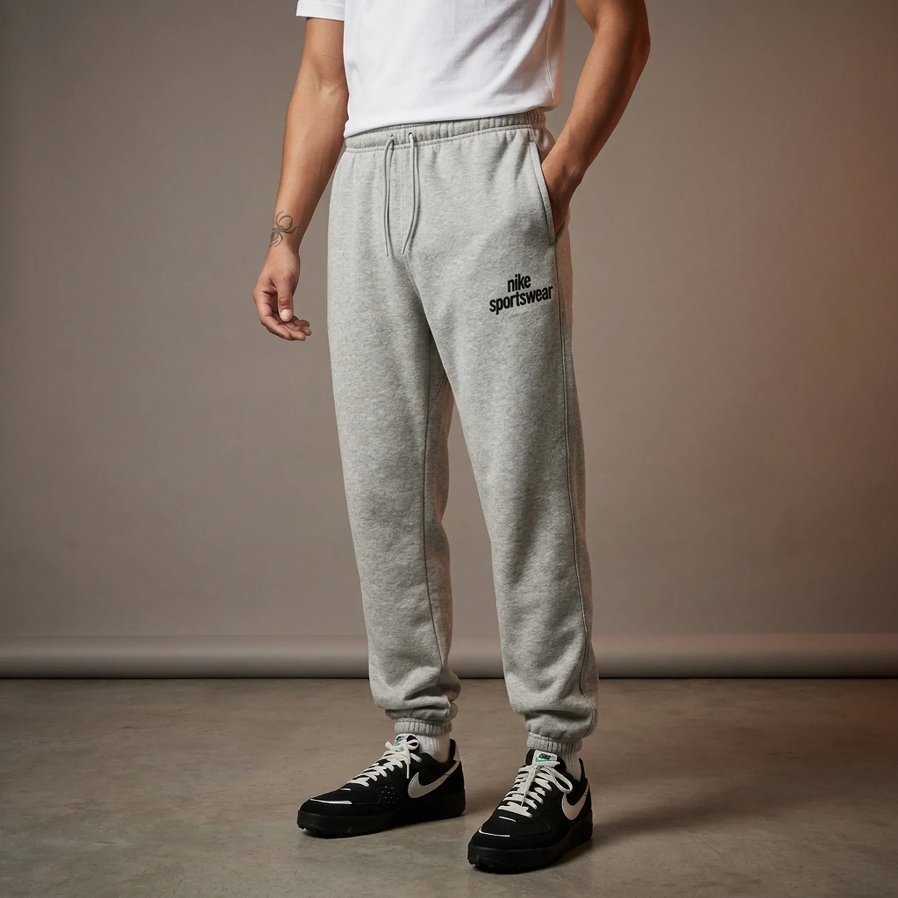 Чоловічі спортивні штани NIKE M CLUB BB CF PANT NSW GFX HJ2185-063