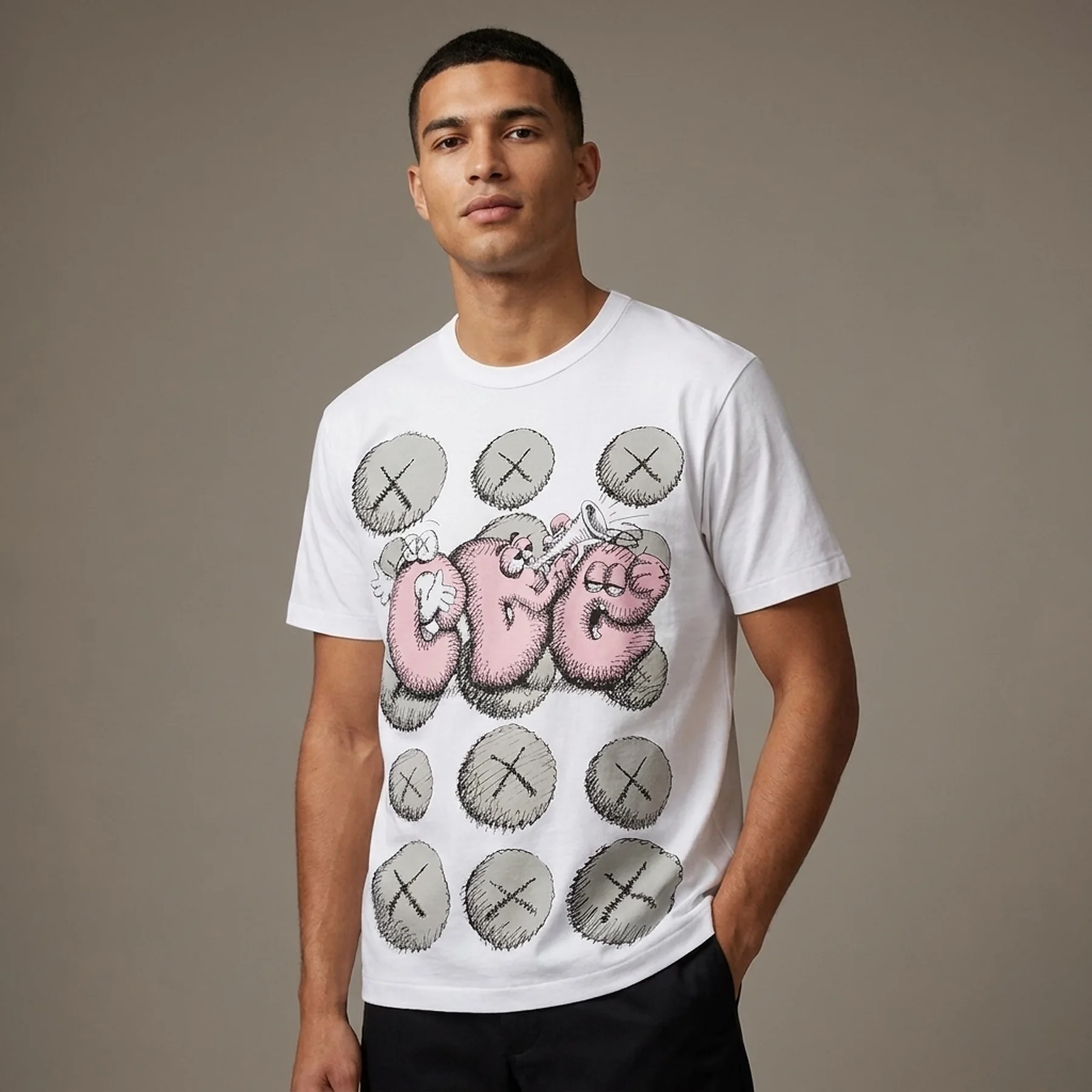 Футболка comme des garçons shirt x kaws print t-shirt