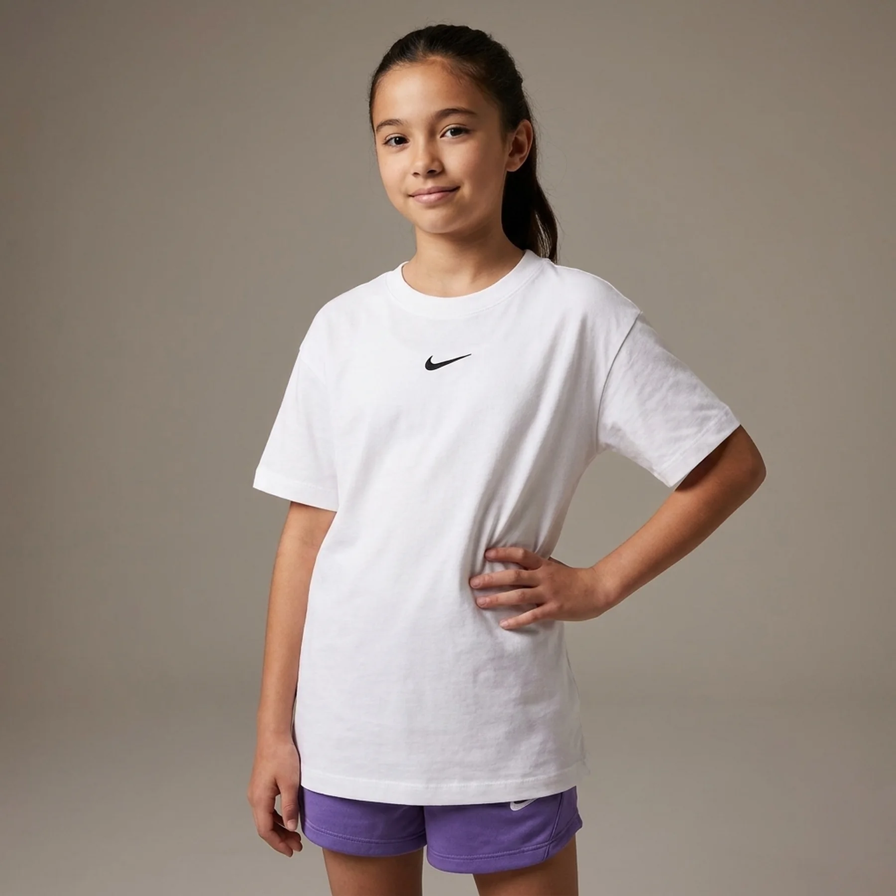Футболка дитяча Nike Sportswear Essential Older Kids' (Girls') T-Shirt (FZ5559-100)