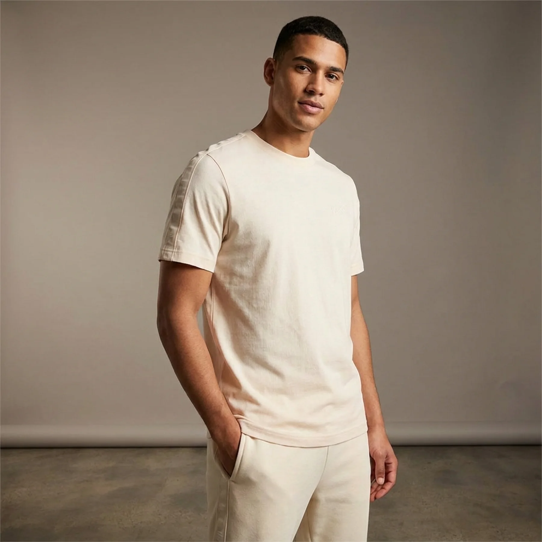 Футболка ESS TAPE Tee 68467487 Puma L Кремовий