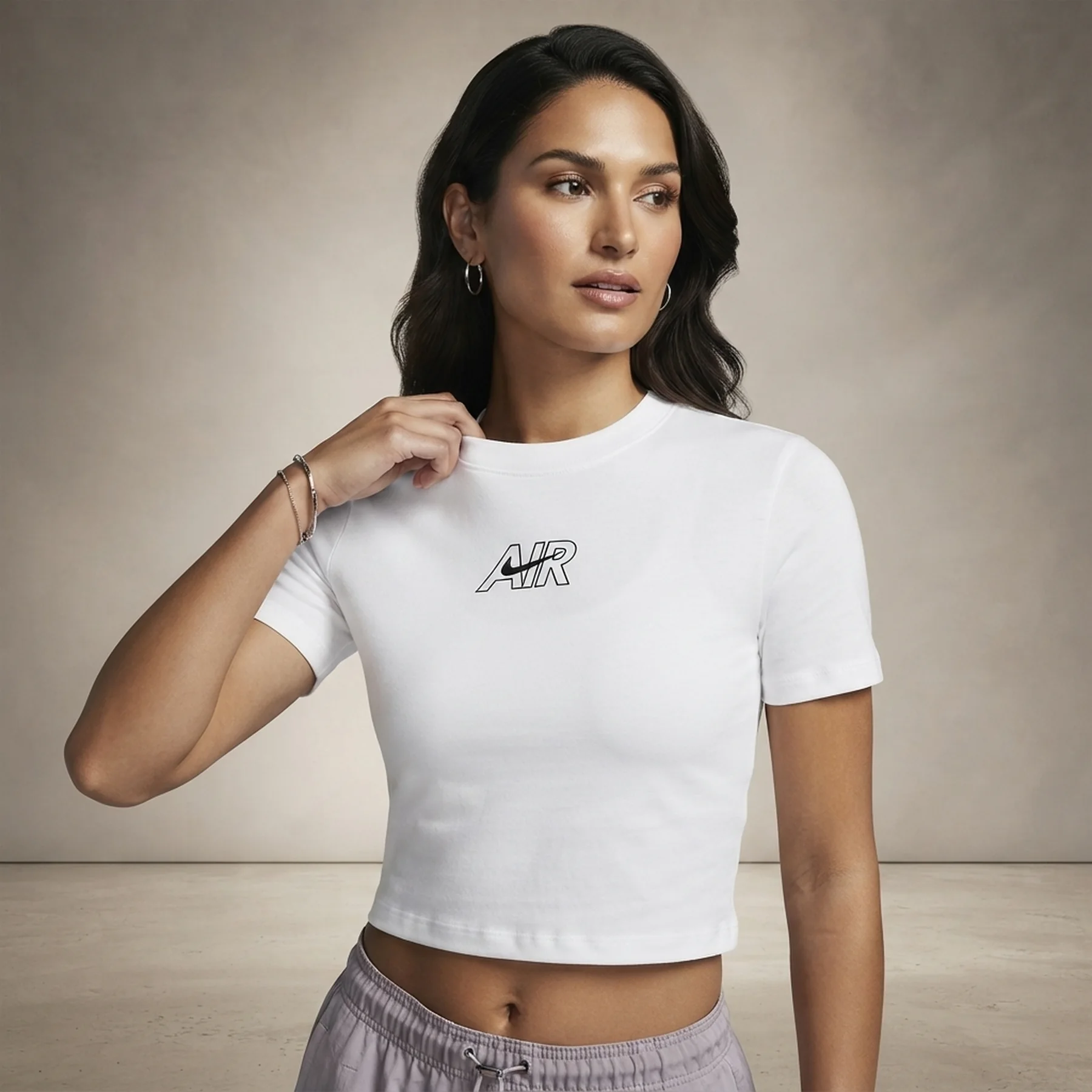 Футболка жіноча Nike Air Slim Cropped (DN5852-100)