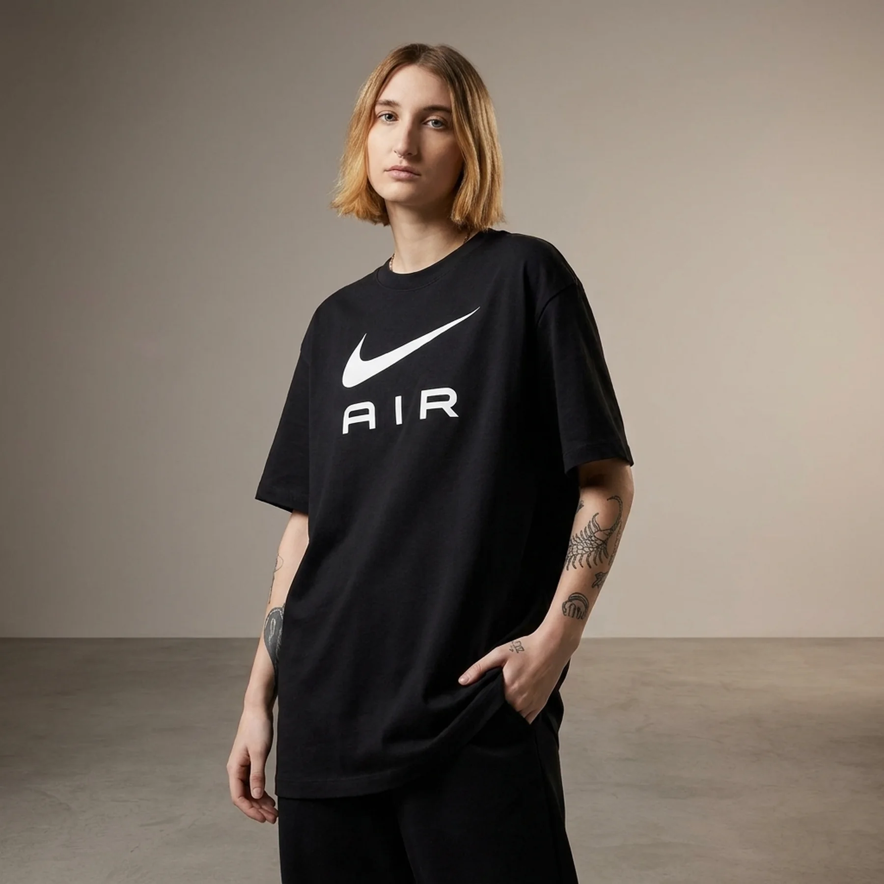 Футболка жіноча Nike Nsw Tee Air Bf (DX7918-010)