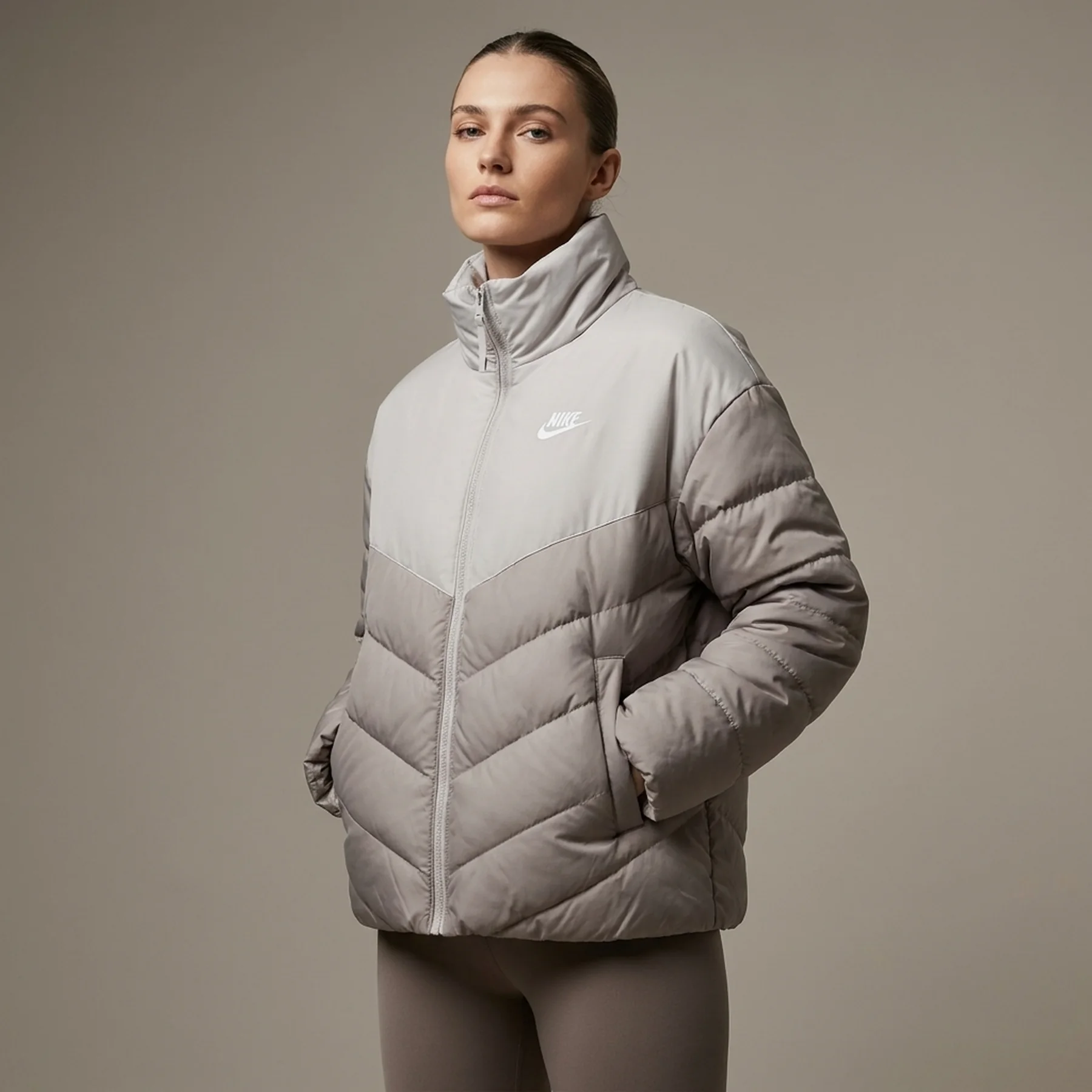 Куртка жіноча Nike Therma-Fit Loose Puffer Jacket (FB8788-019)