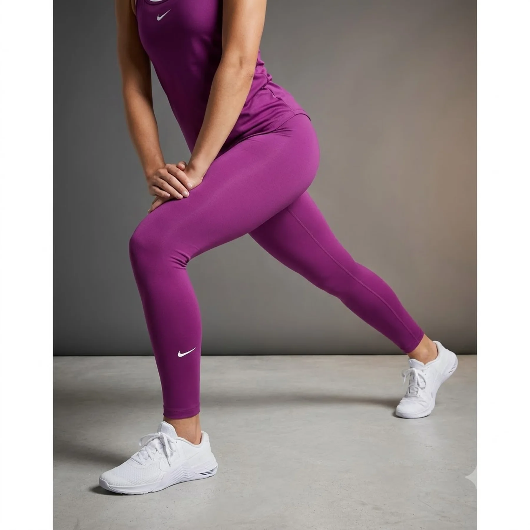 Лосіни жіночі Nike Fast Violet (AT3103-503)