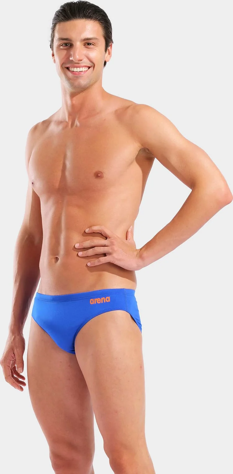 Плавки Arena TEAM SWIM BRIEFS SOLID синій, помаранчевий Чол 85
