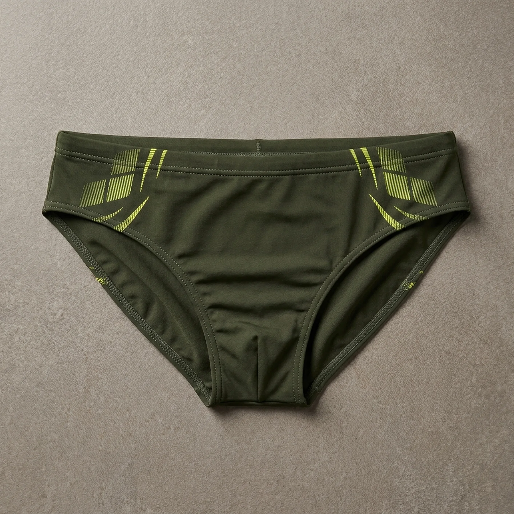 Плавки-сліпи для хлопчиків Arena POSEIDONIA SWIM BRIEFS темно-зелений, жовтий Діт 128 см