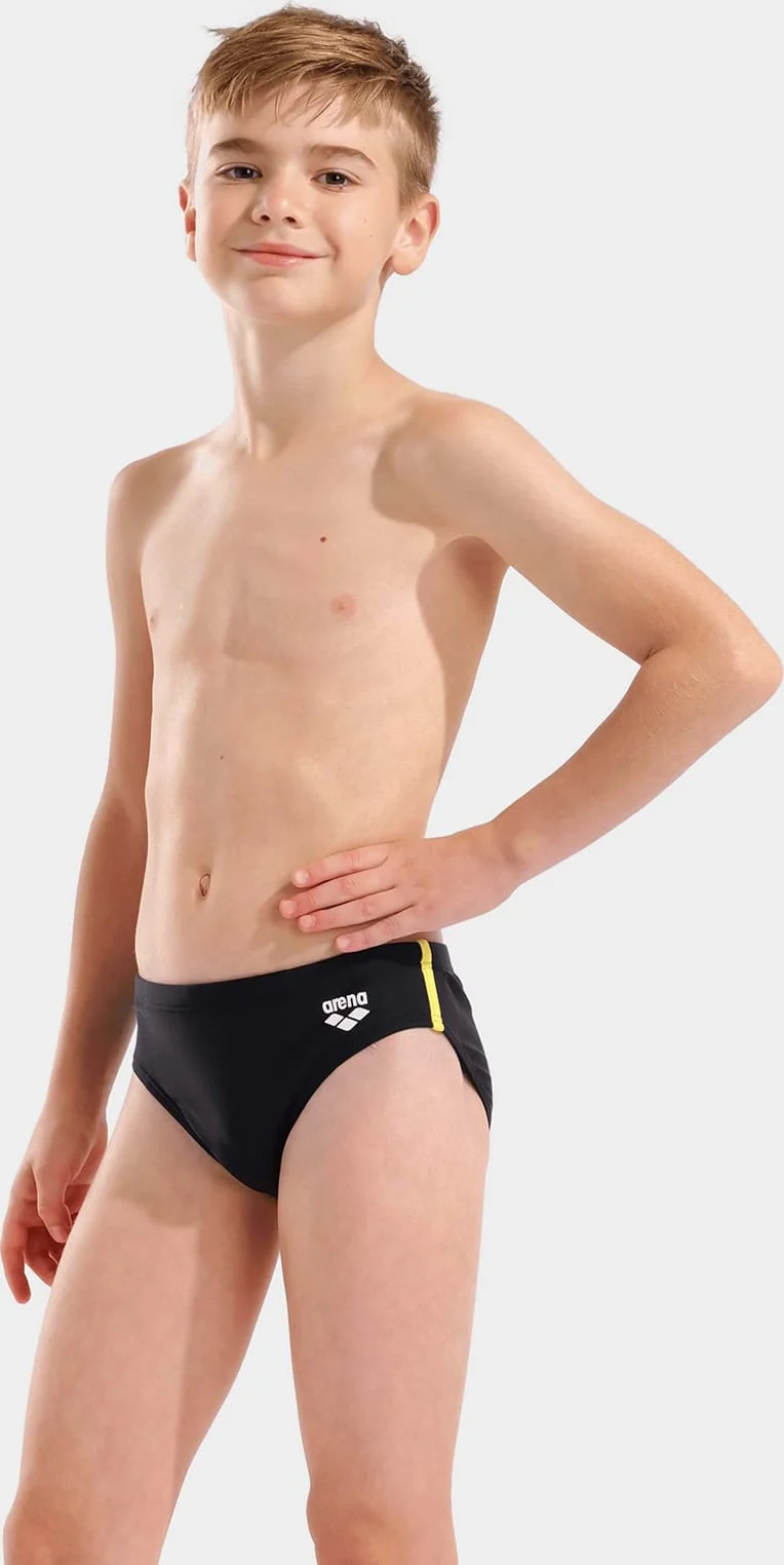 Плавки для хлопчиків Arena SWIM BRIEFS SOLID чорний, жовтий 116 см (008371-583)