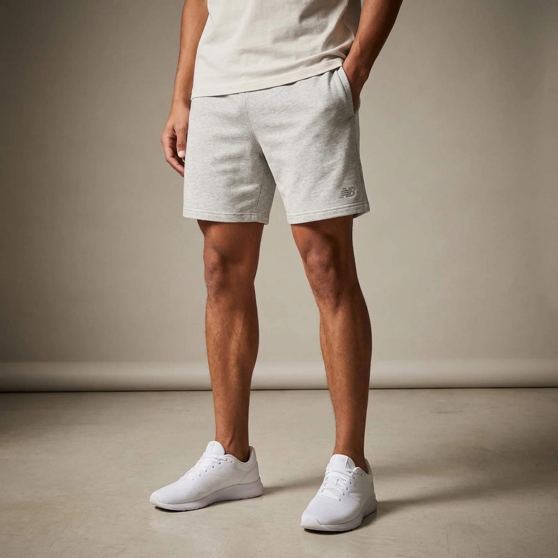Шорти чоловічі New Balance Sport Essentials Heathertech Short 7 (MS41073AGT)