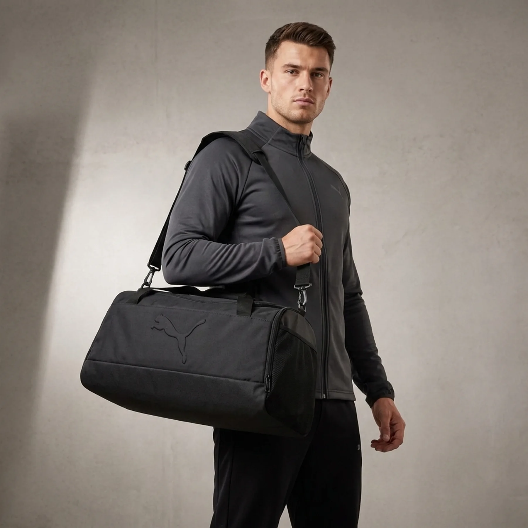 Спортивна сумка Unisex PUMA BUZZ Medium Sports Bag 09144301 Puma Чорний