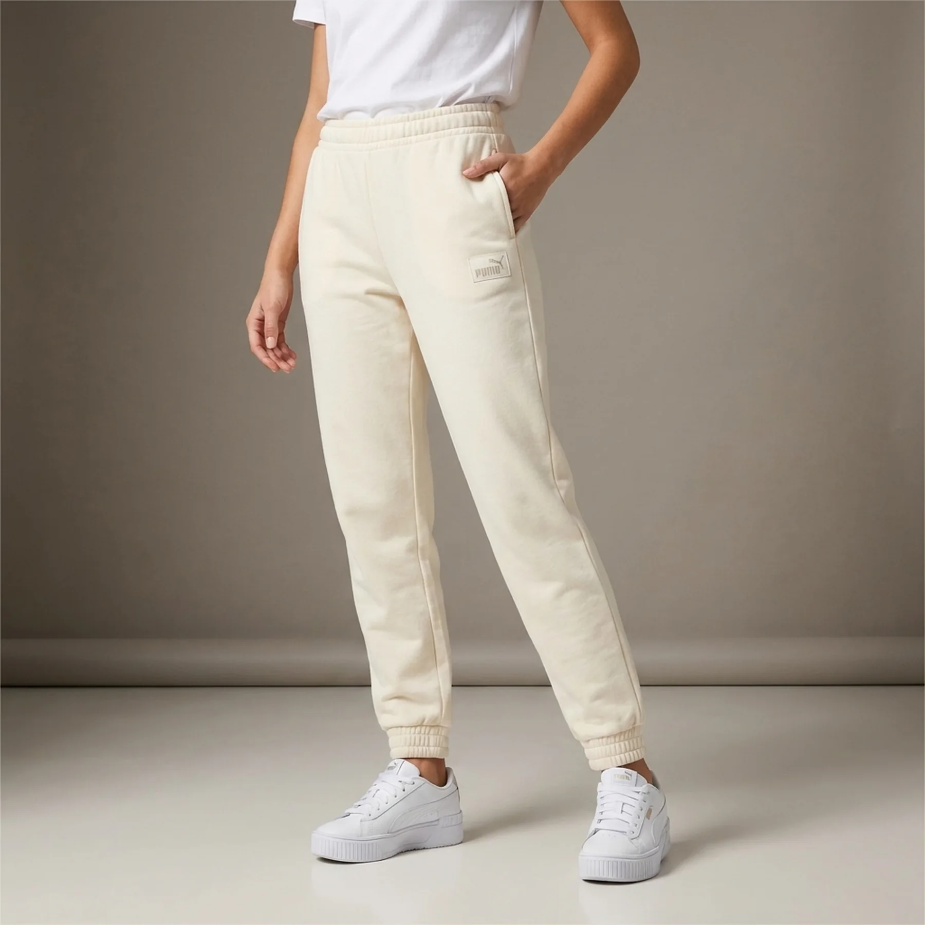 Спортивні штани ESS ELEVATED Sweatpants 68501999 Puma L Кремовий
